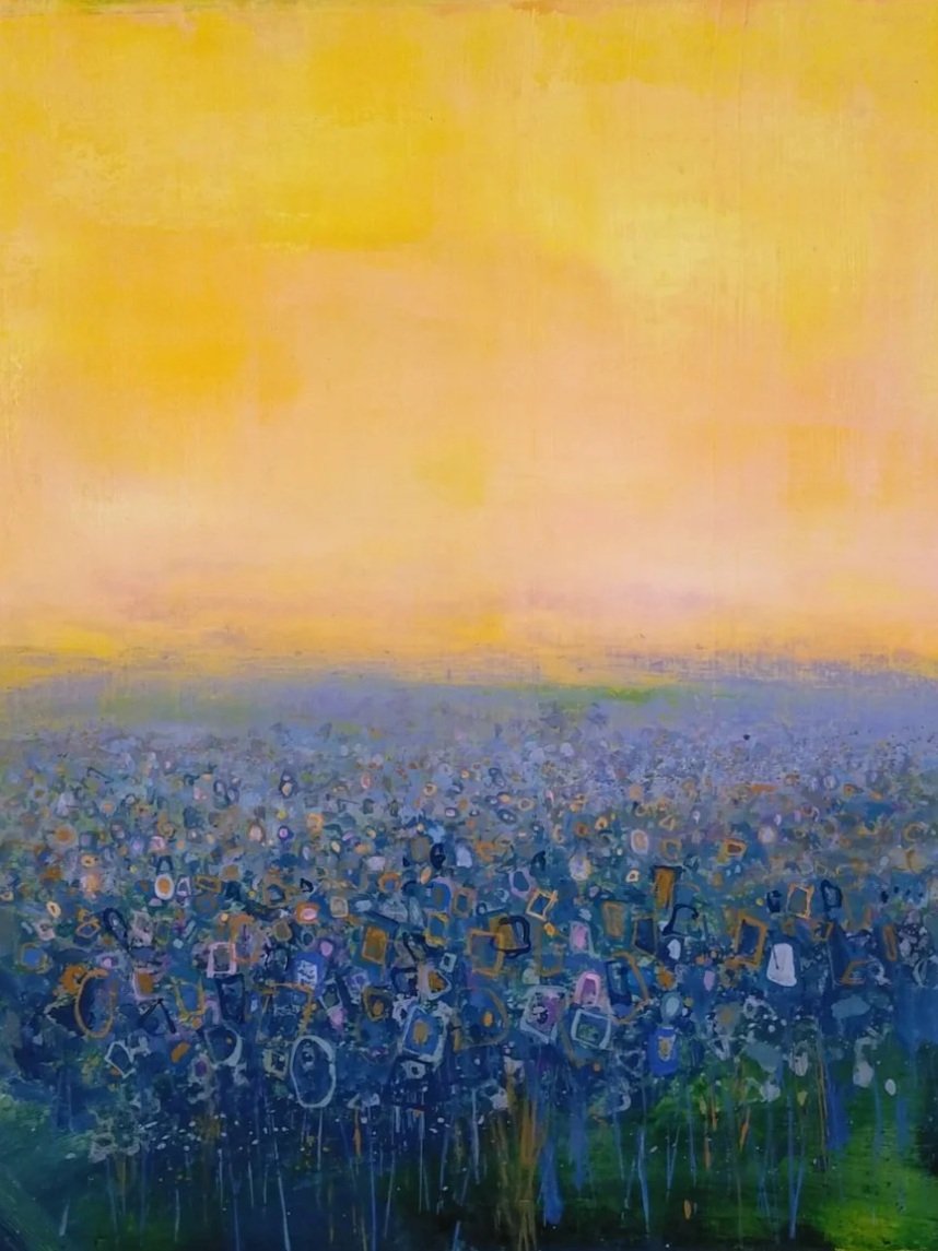 An abstract painting of a field of blue and purple flowers beneath a yellow-orange sky.