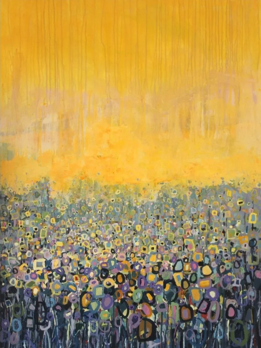 Abstract painting with a yellow-orange gradient sky above a field of multicolored floral shapes.