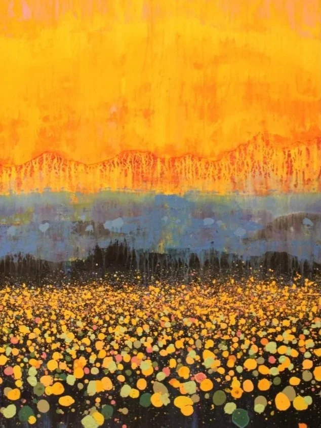Abstract painting depicting a vibrant yellow and orange sky above a landscape of dark mountains and colorful dandelions in the foreground.