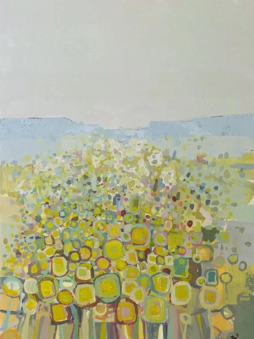 An abstract painting of a field of yellow sunflowers under a pale sky, with colorful circular shapes representing the flowers.