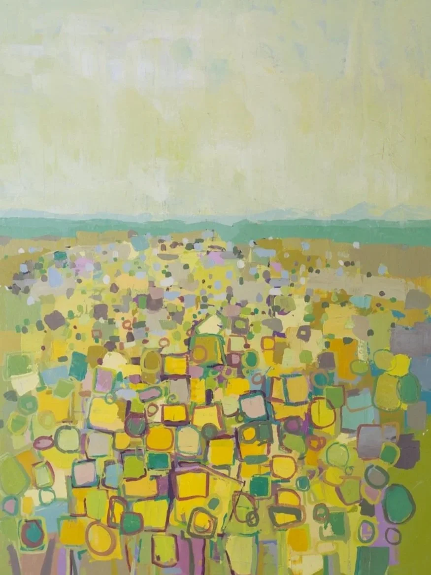 Abstract landscape painting depicting a vast field of colorful, irregular shapes representing crops under a light sky.