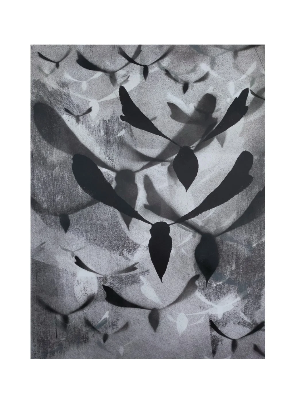 Abstract black and white artwork featuring silhouette leaves and branches.