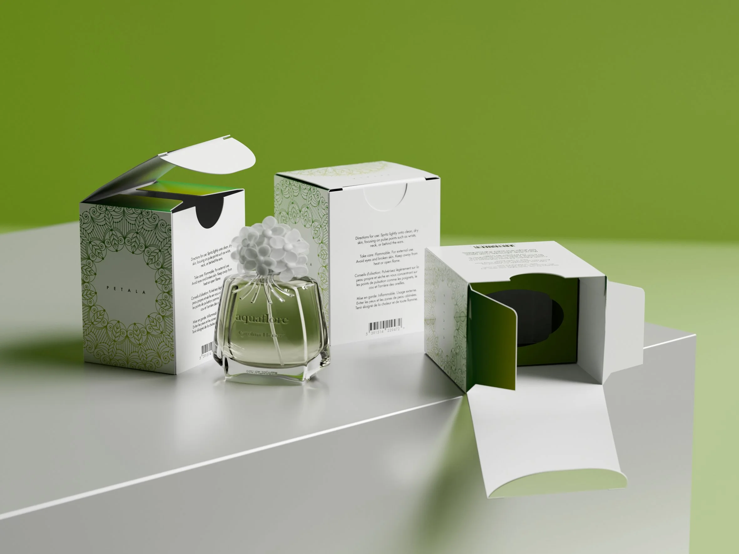 Assorted perfume boxes and a glass perfume bottle on a white shelf against a green background. Carton packaging produced by Windles Packaging.