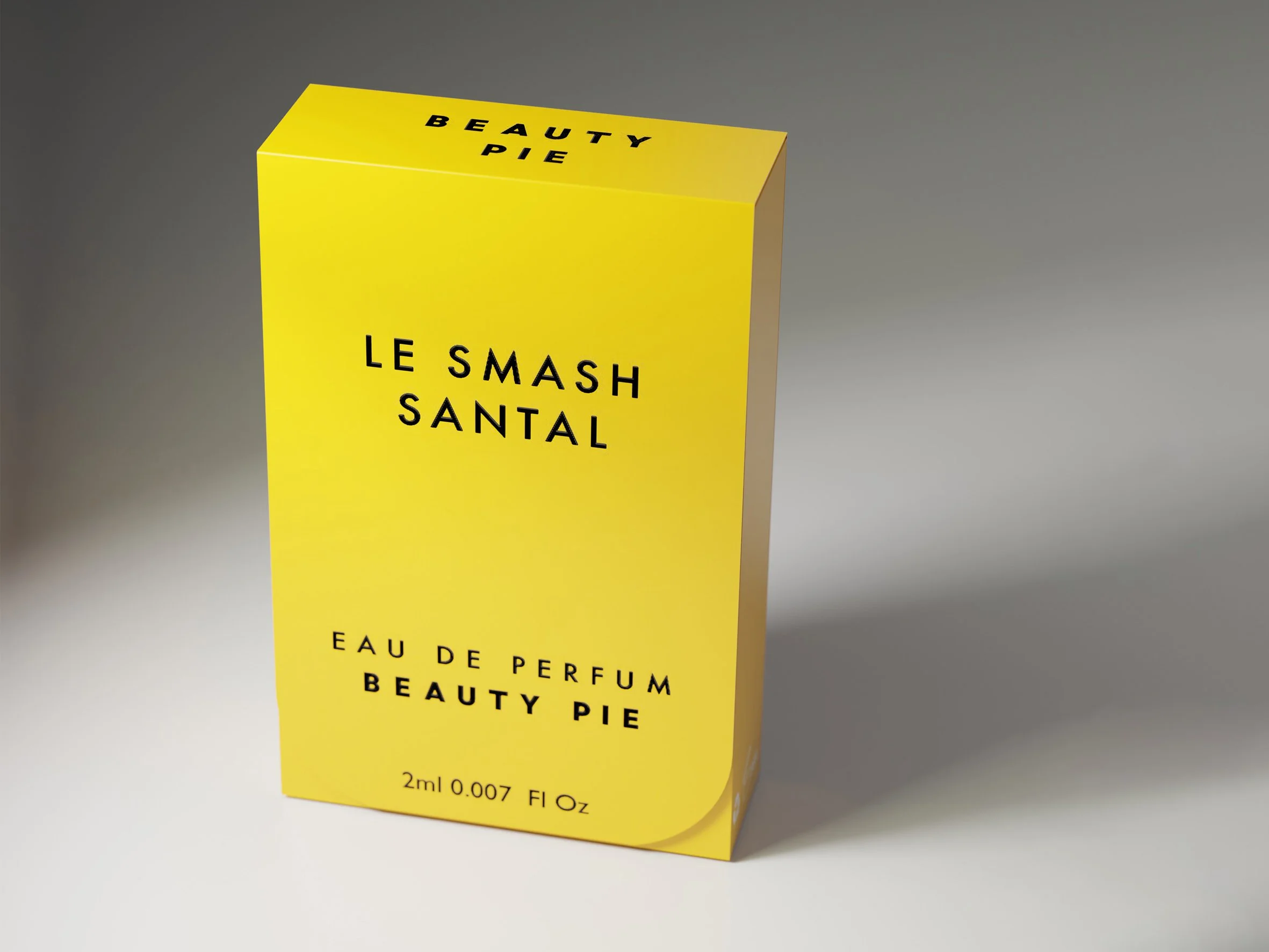 Yellow box of Beauty Pie Le Smash Santal perfume with black text Carton packaging produced by Windles Packaging.
