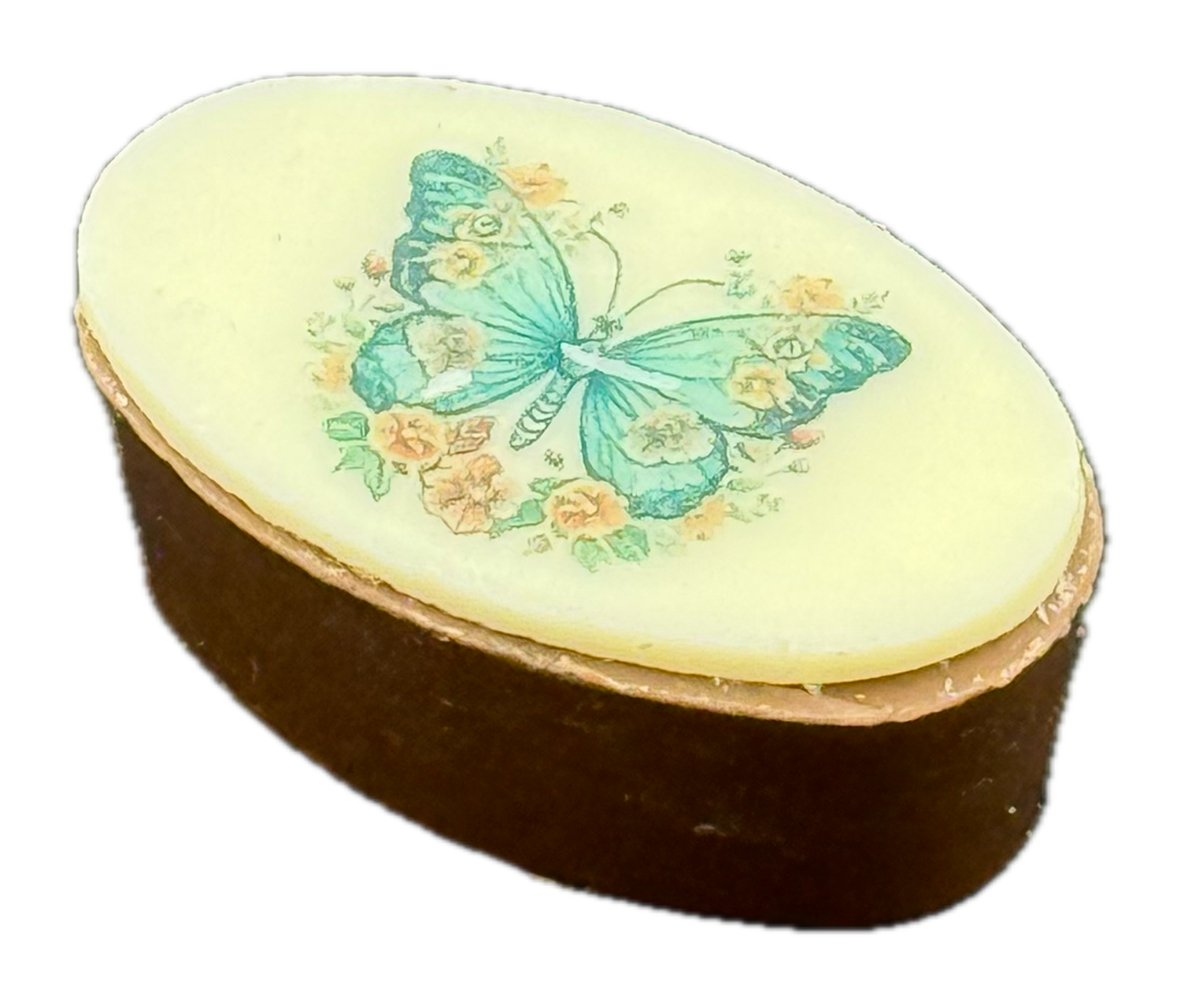 Gefüllte, ovale Praline mit einem Bild