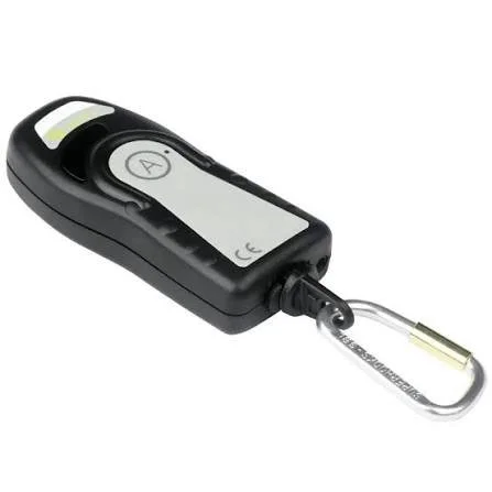 A portable breathalyzer device with a keychain attachment and LCD display.