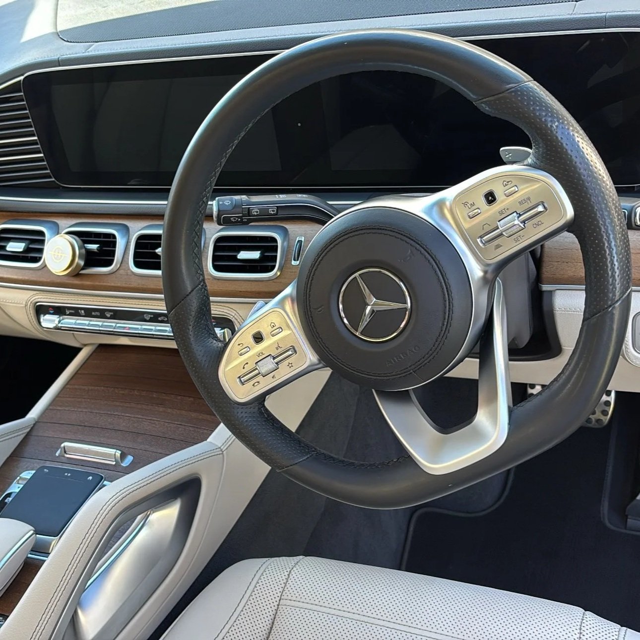 Detailed Mercedes-Benz interior with cleaned leather seats and dashboard
