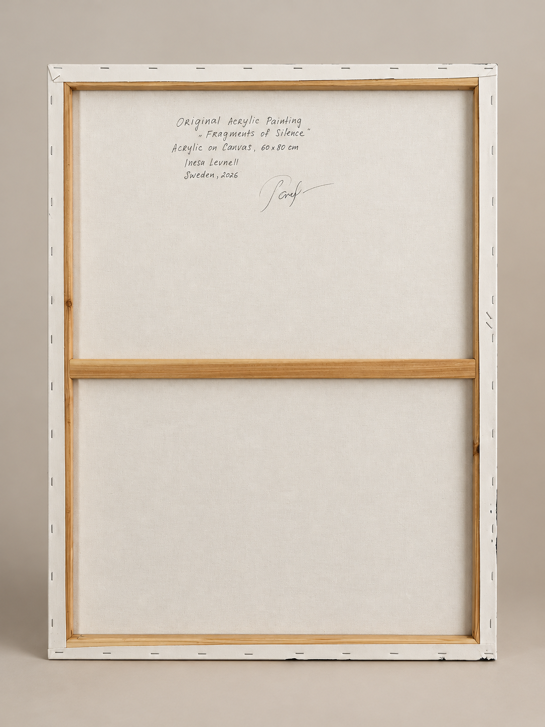 Back view of Fragments of Silence, showing the original stretched canvas, wooden stretcher bars and handwritten artwork details.