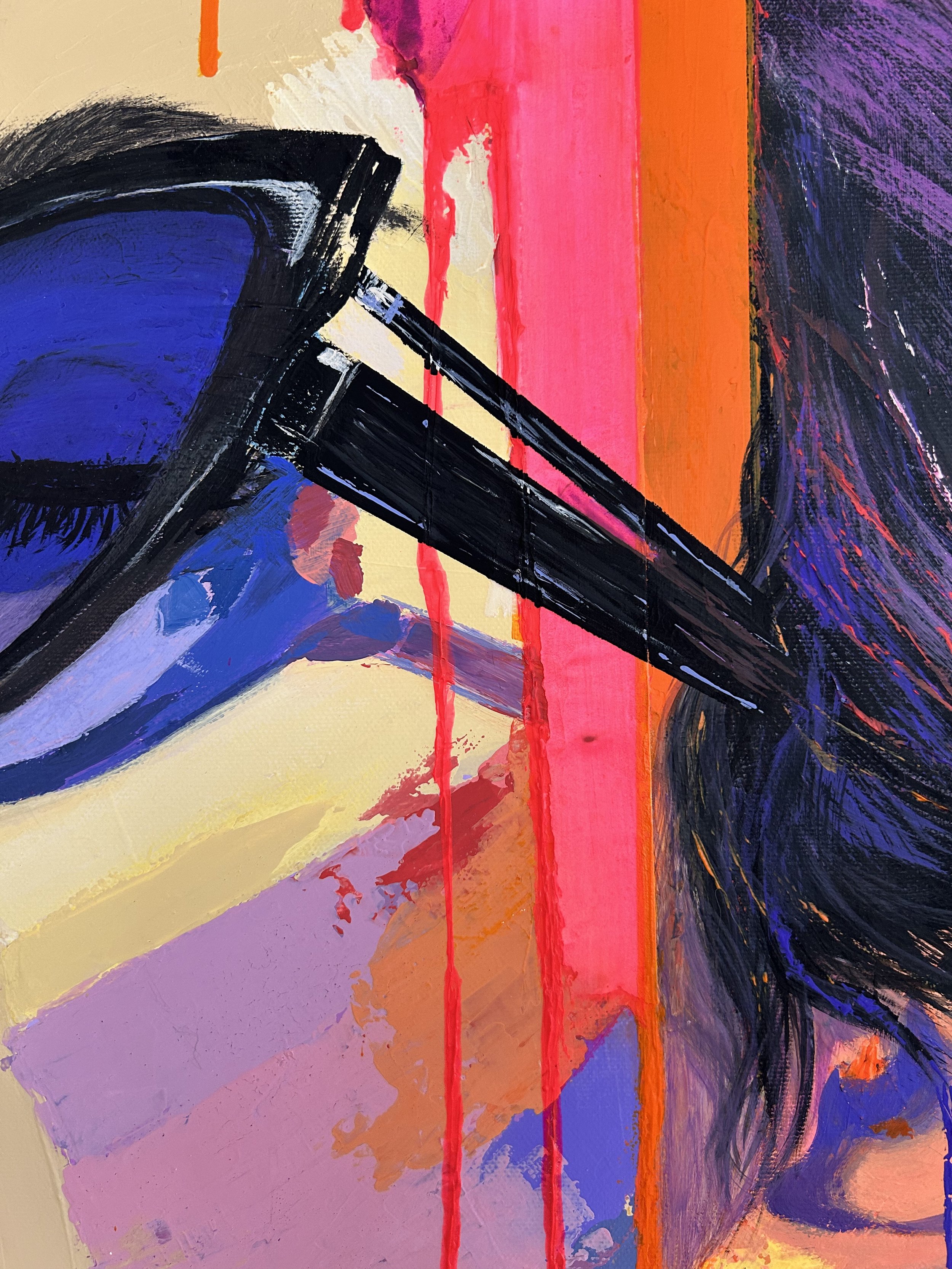 Close-up of Rose Signal showing the dark sunglasses, pink and orange vertical paint marks, facial colour planes and dark hair.