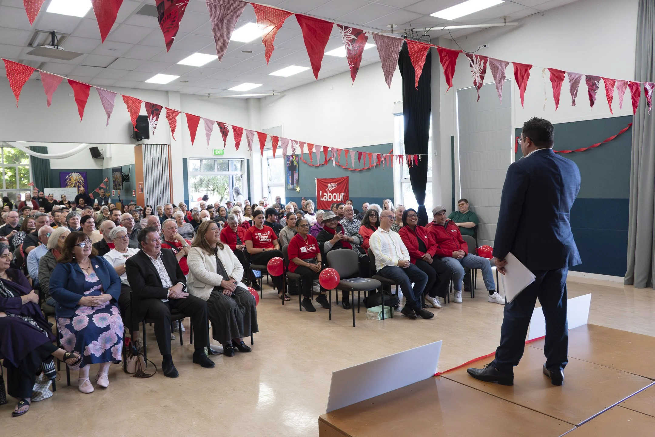 An example of Event Photography of Tangi Utikere speaking in front of a crowd at his Palmerston North Labour Campaign Launch