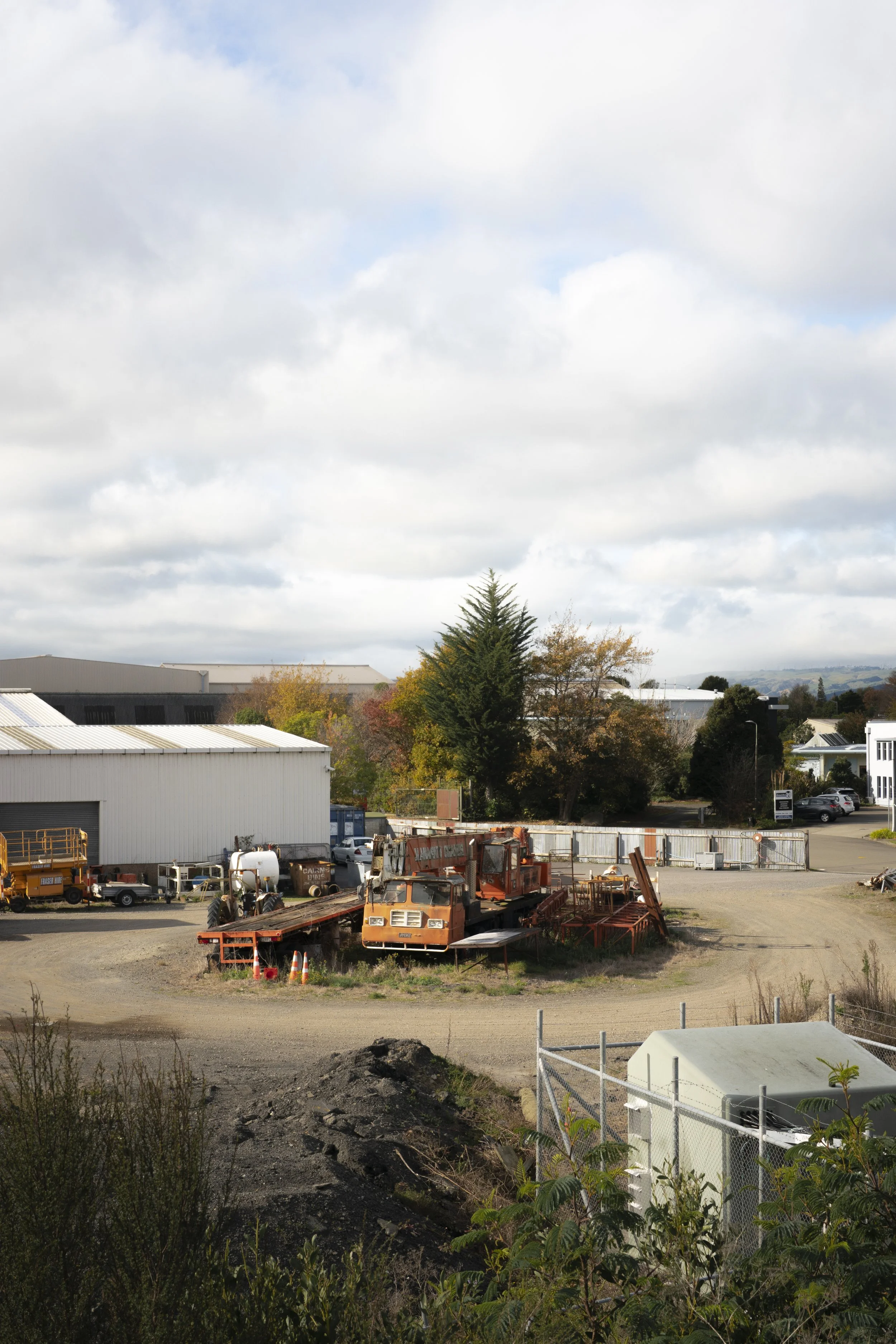 An example of Slice of Life Photography of an old crane rusting in a yard in Palmerston North