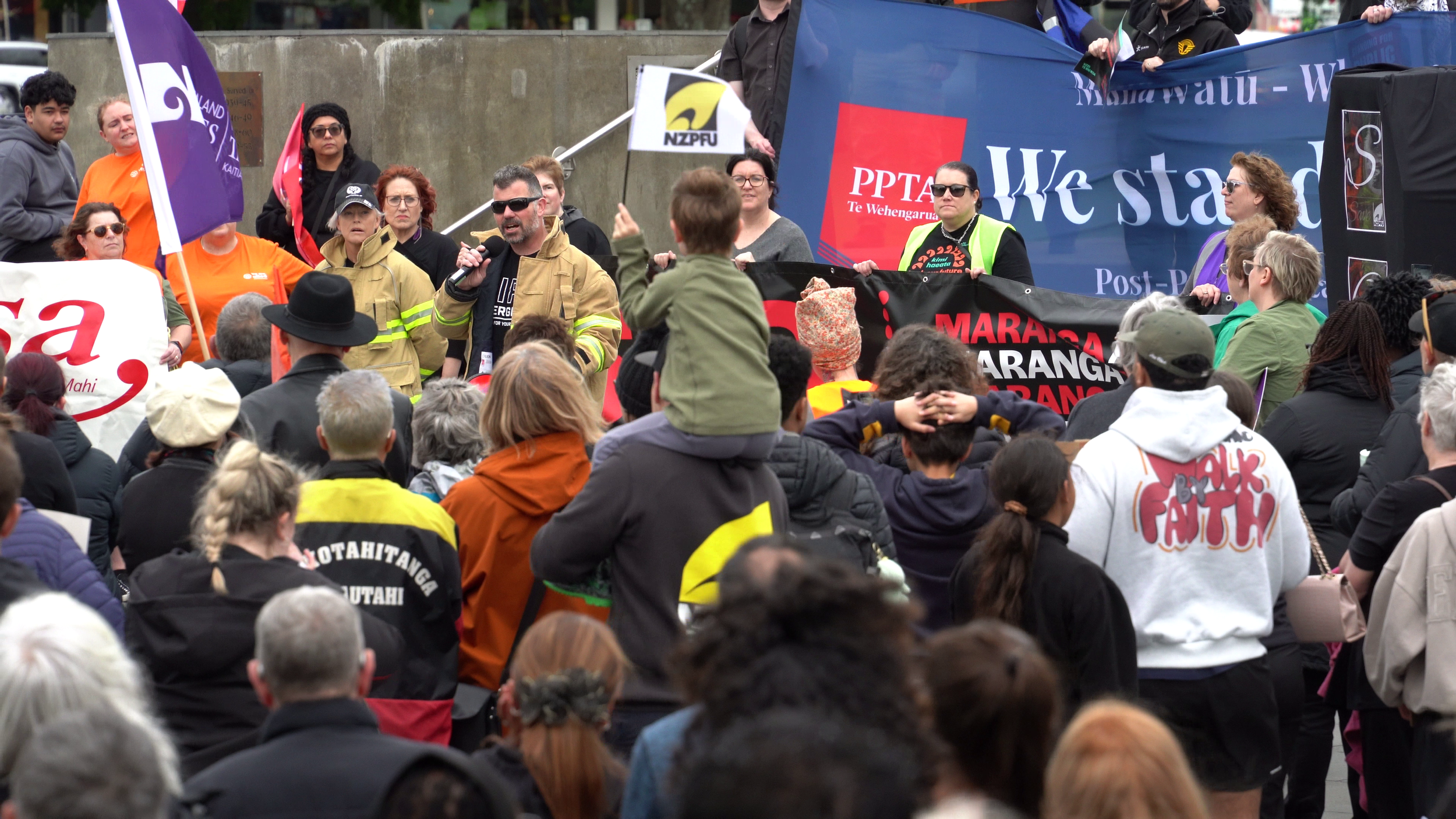 An example of Documentary Photography of a Fireman speaking at a rally in Palmerston North