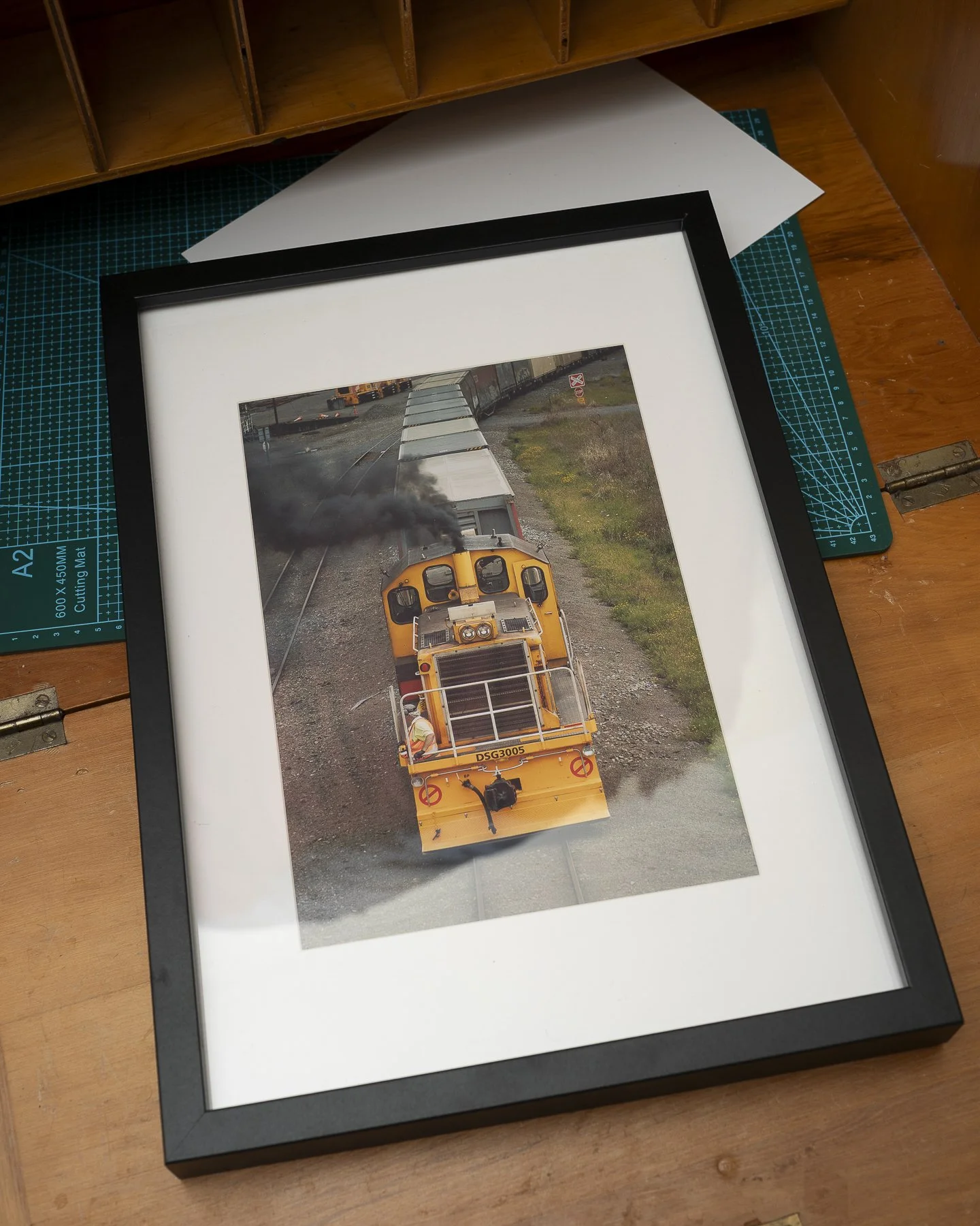 Photographic framed print of a Worker operating a train in Palmerston North