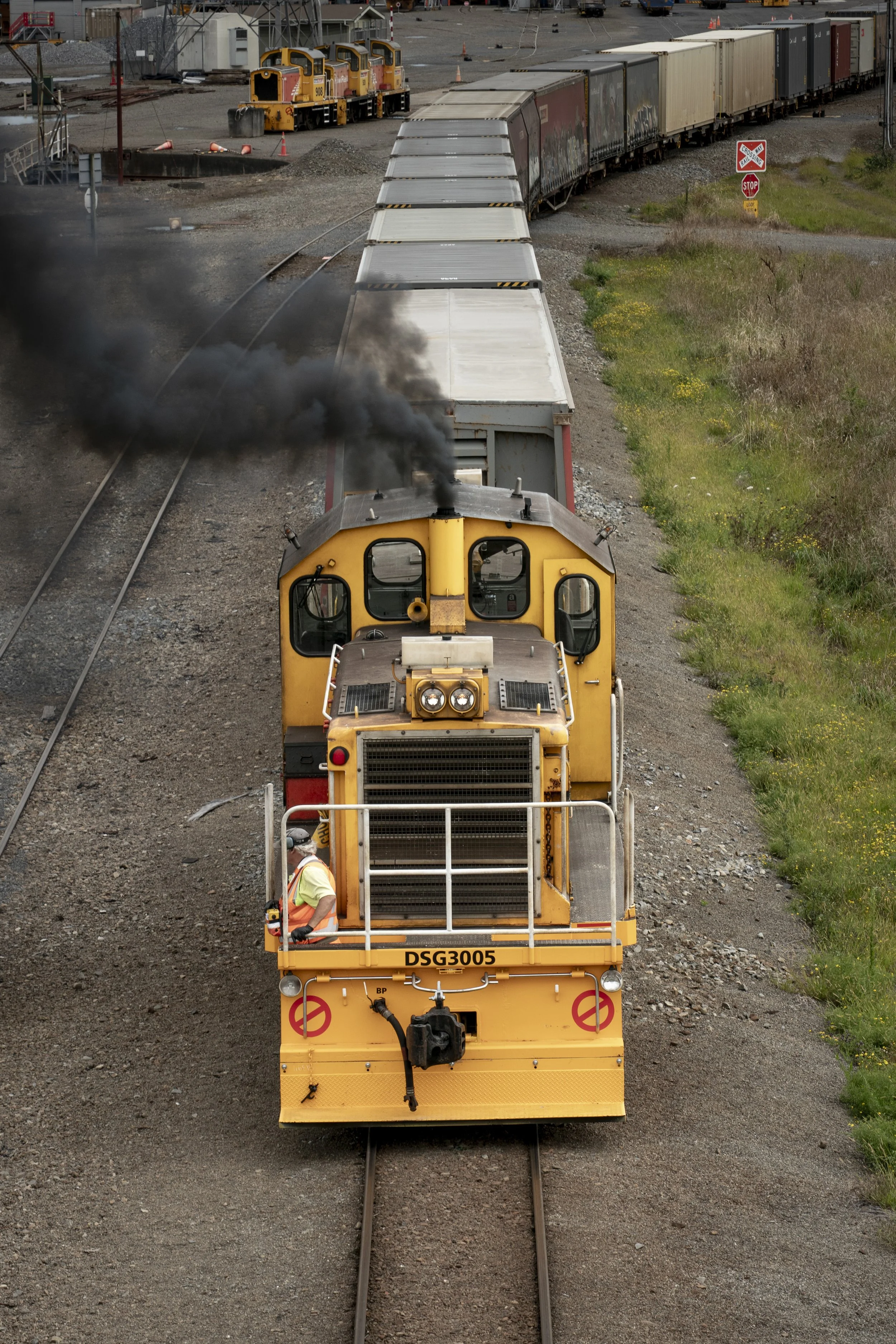 An example of Slice of Life Photography of a Worker operating a train in Palmerston North