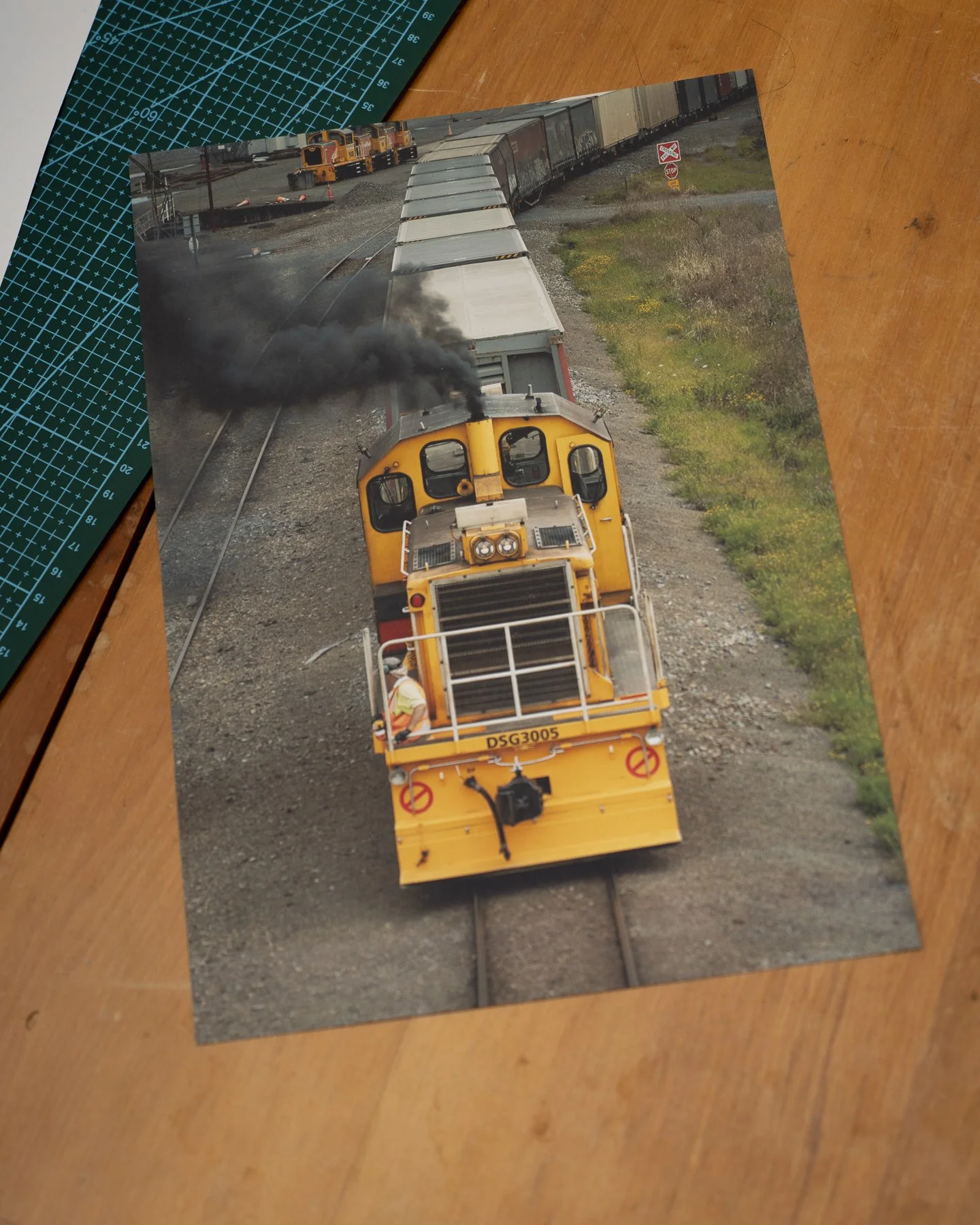 Photographic print of a Worker operating a train in Palmerston North