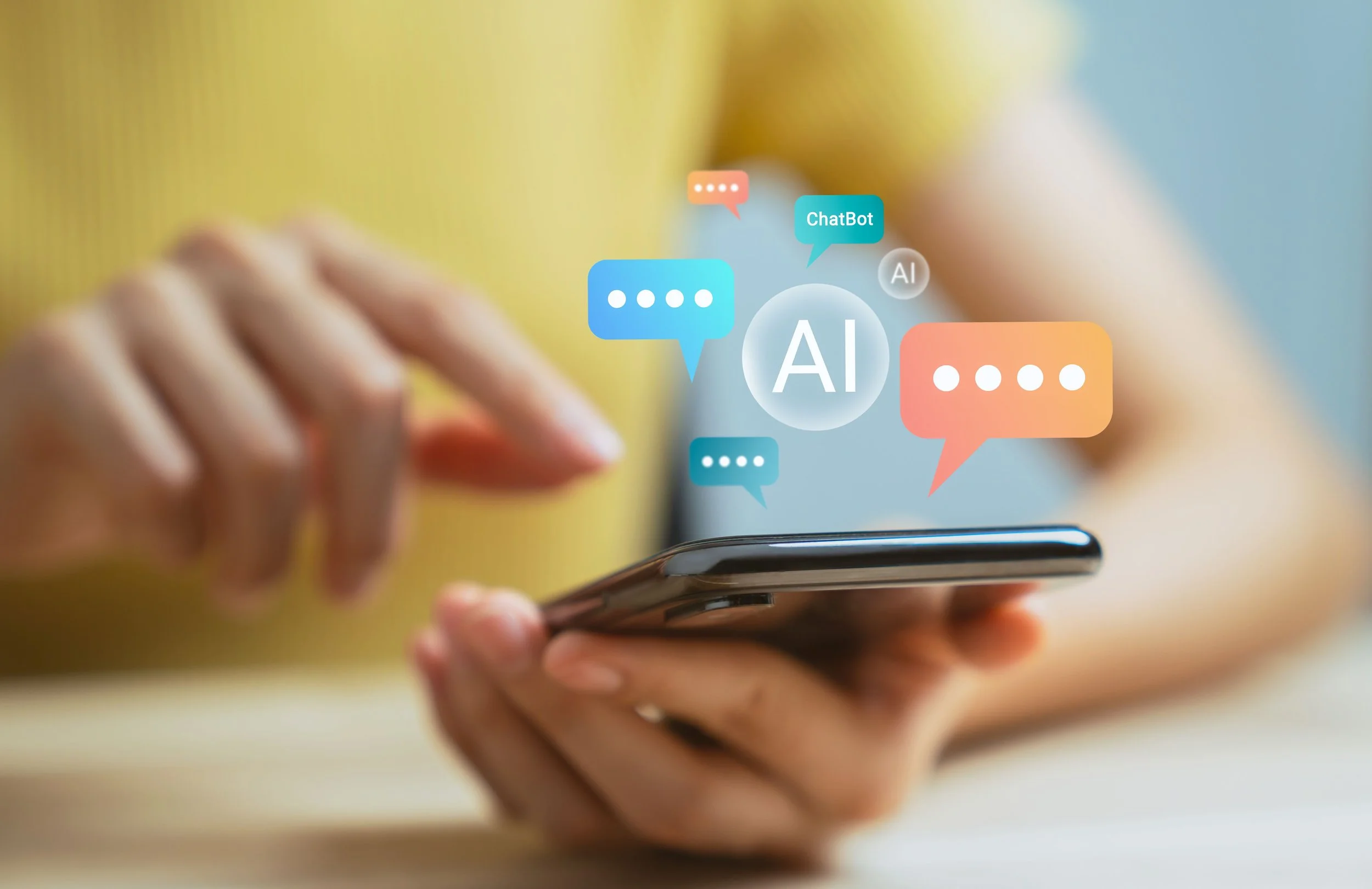 A person holding a smartphone with digital chat bubbles and AI icons floating above the screen.