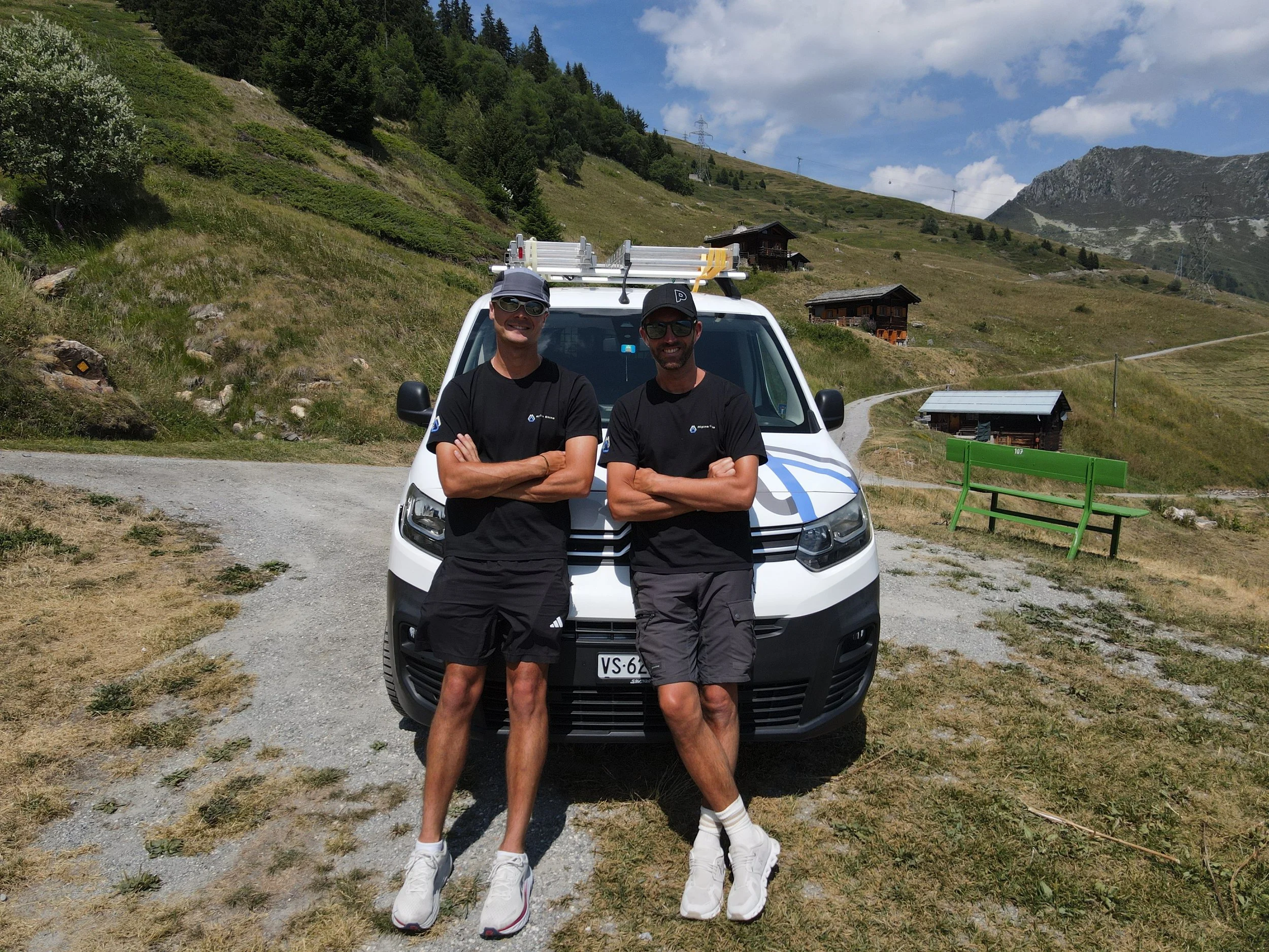 Alpine Shine team in front of their window cleaning company van in Verbier, Switzerland