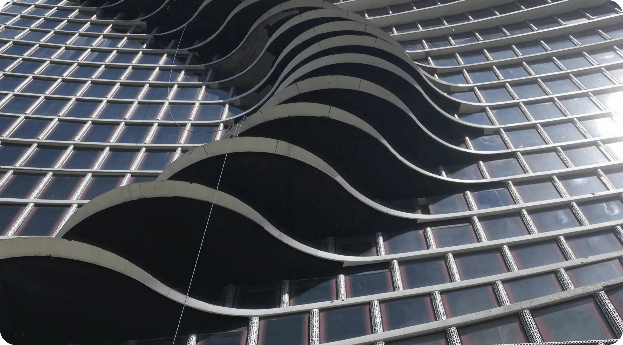 An abstract photograph of a corporate building in the Philippines.