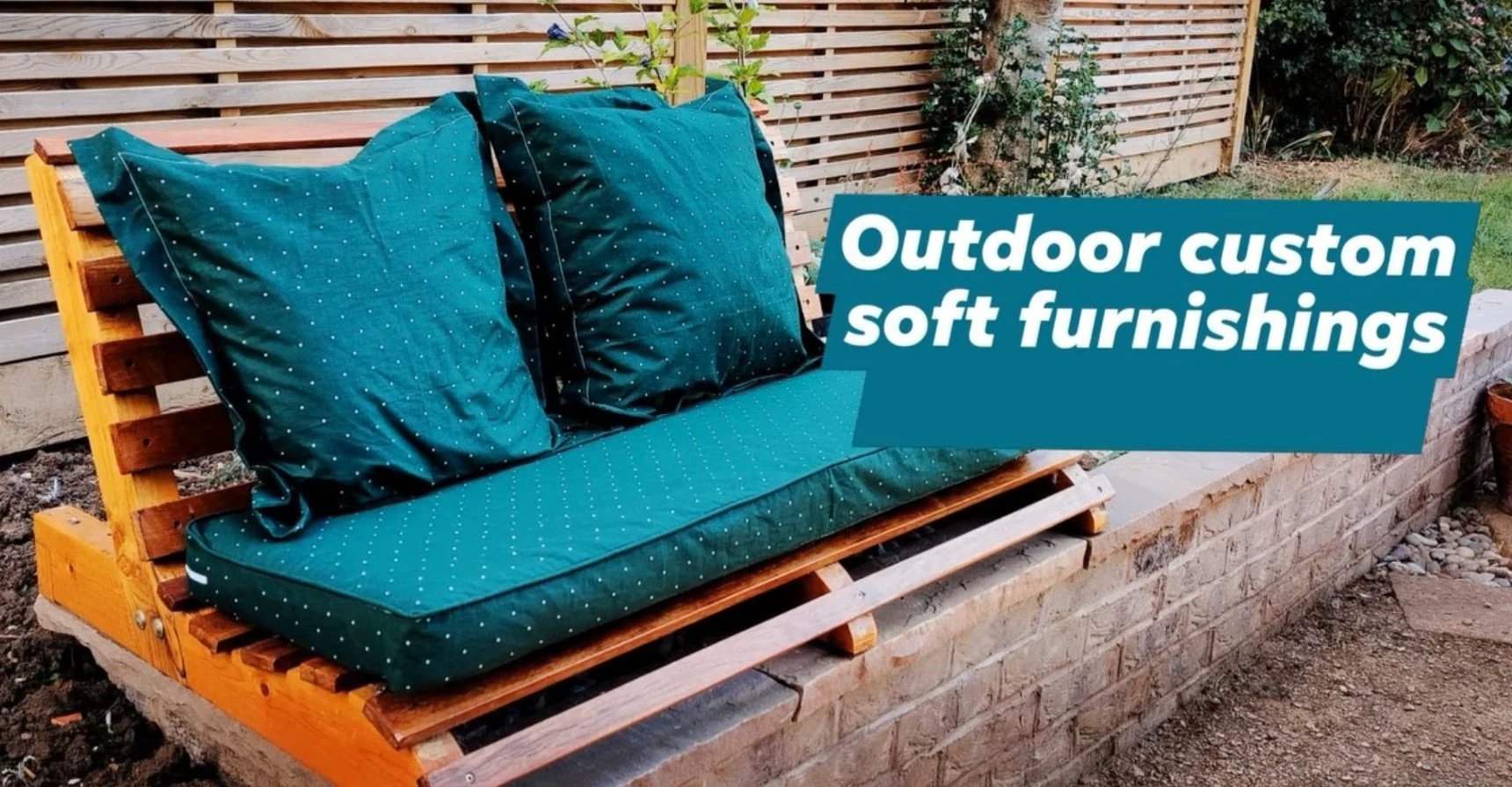 box and scatter cushions on wooden garden bench