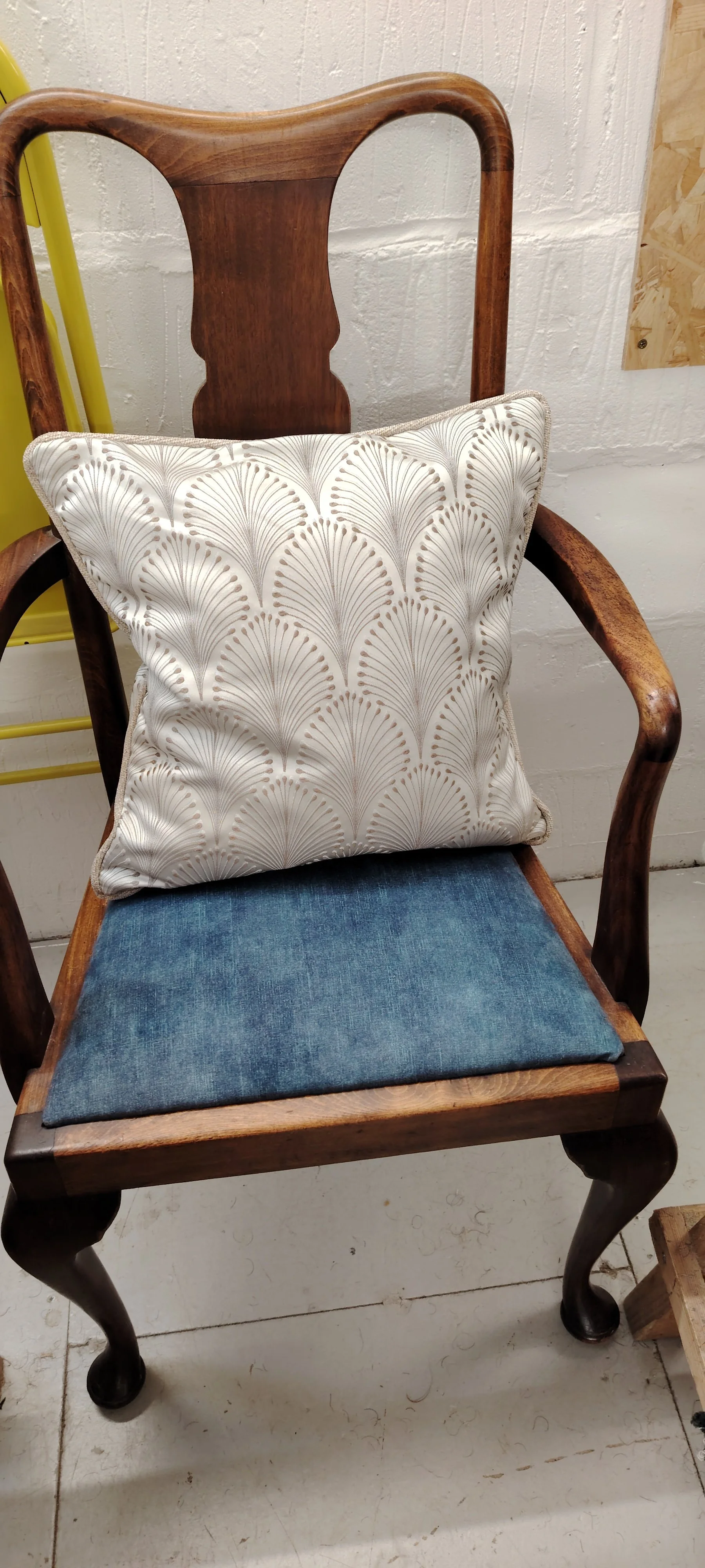 Queen Anne style carver armchair with cabriole legs and blue upholstered seat with cream cushion