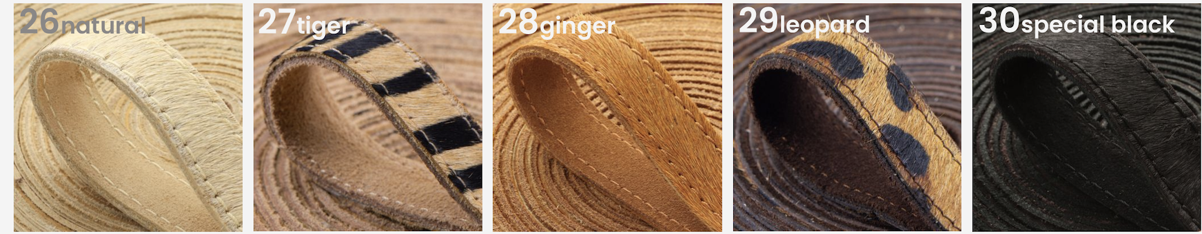 Close-up view of five leather watch straps in different colors and patterns, labeled from 26 to 30: natural, tiger, ginger, leopard, and special black.