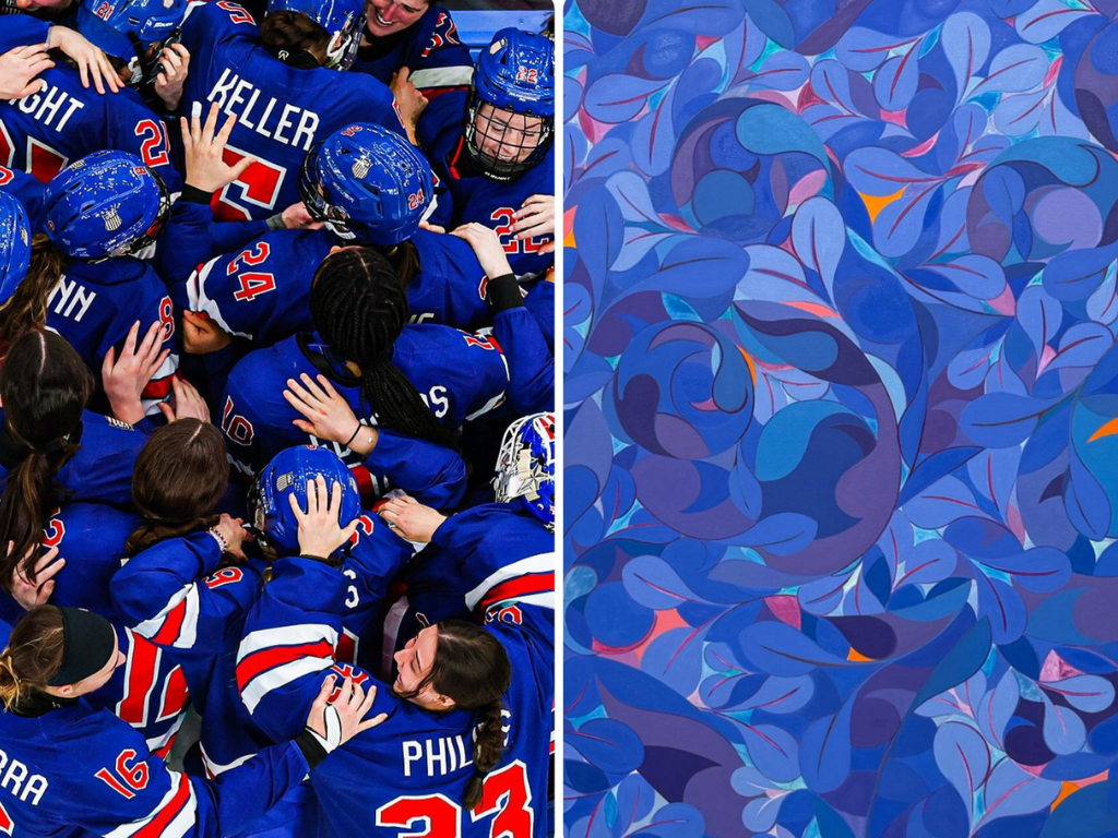 Ice hockey team in blue jerseys celebrating together on the ice, with players wearing helmets and hugging each other.