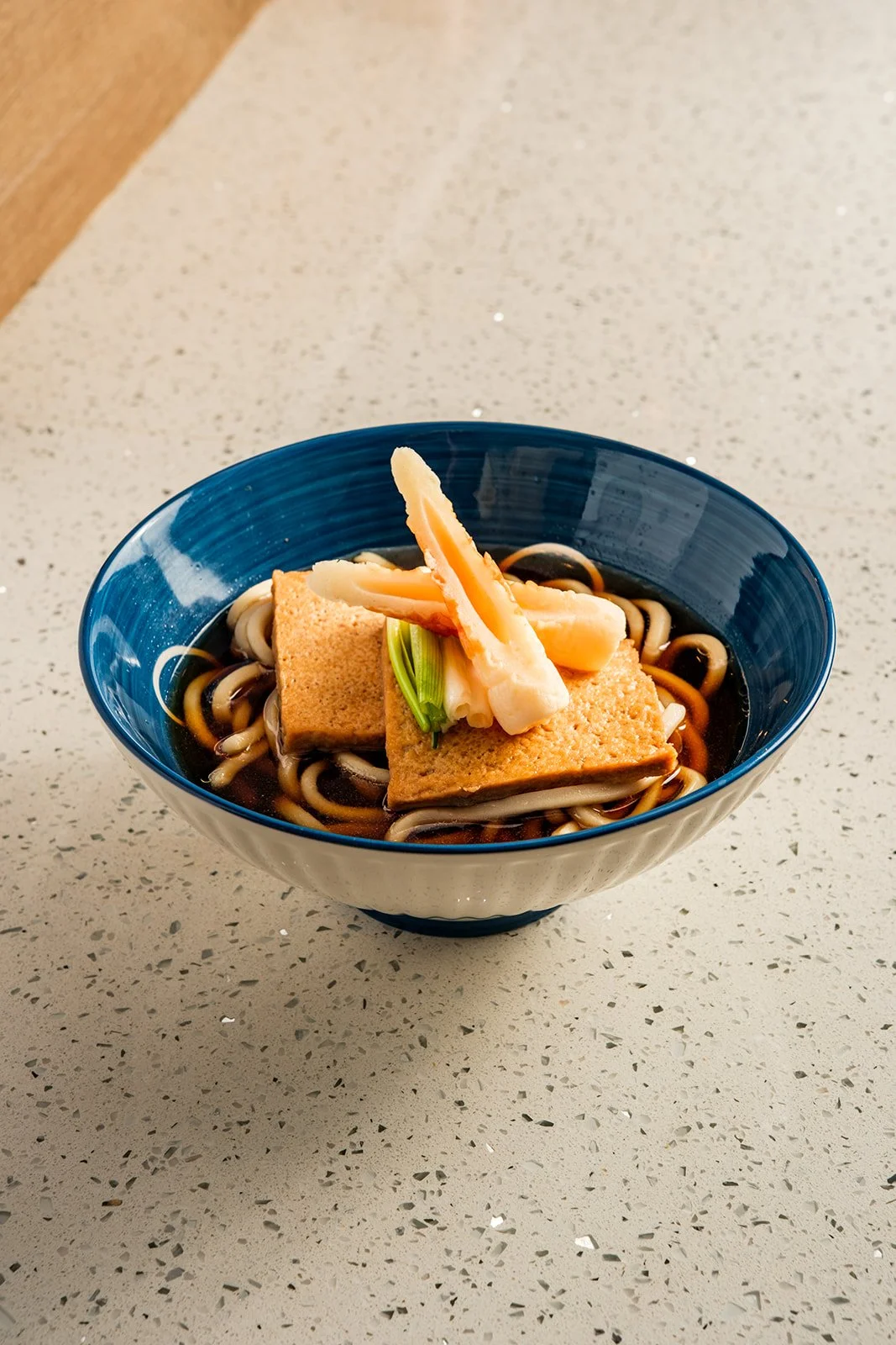 Kitsune Udon |
kake udon + housemade fried & braised tofu pouches + scallions + chikuwa
$16.00