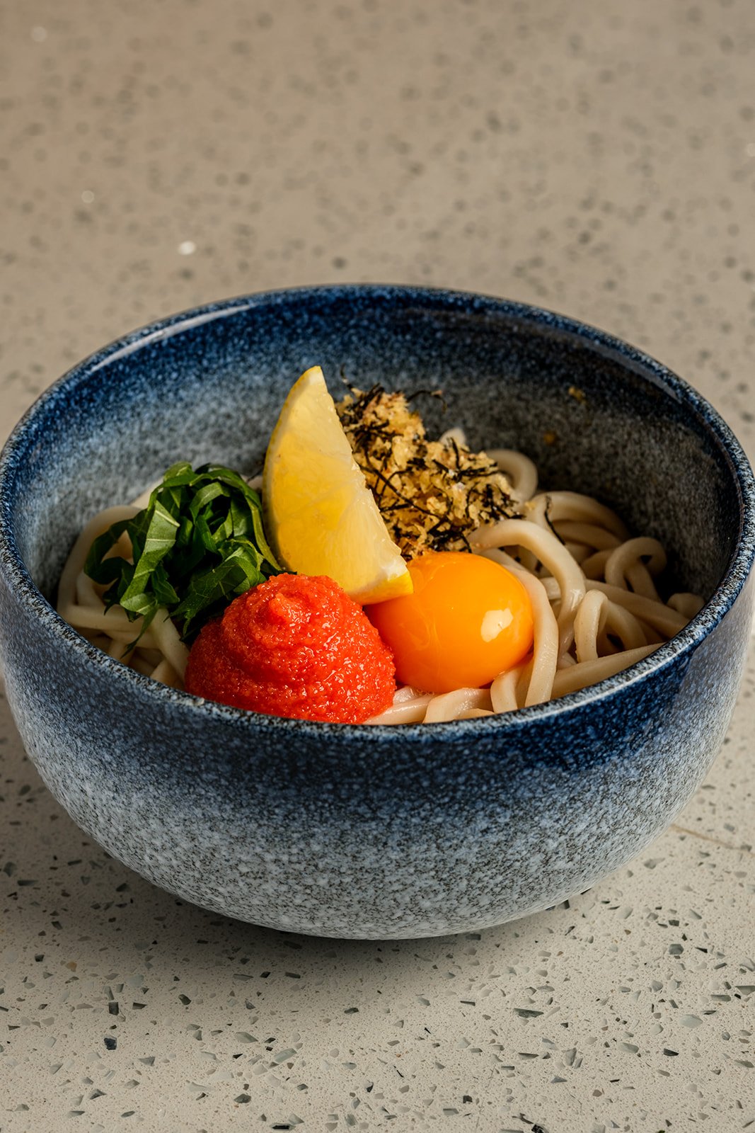 *Creamy Mentaiko Udon |
house udon + pollock roe sauce + shiso + nori crunch + *egg yolk
$17.00
