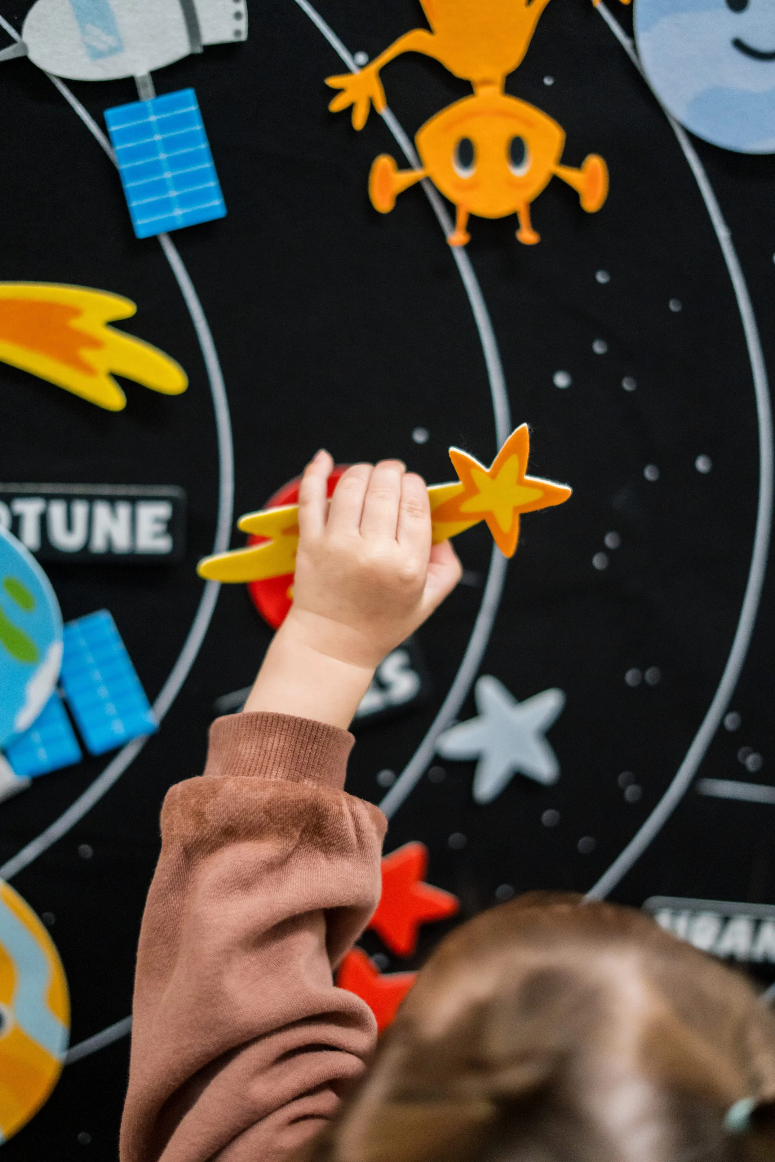 Child completing an activity during an evaluation