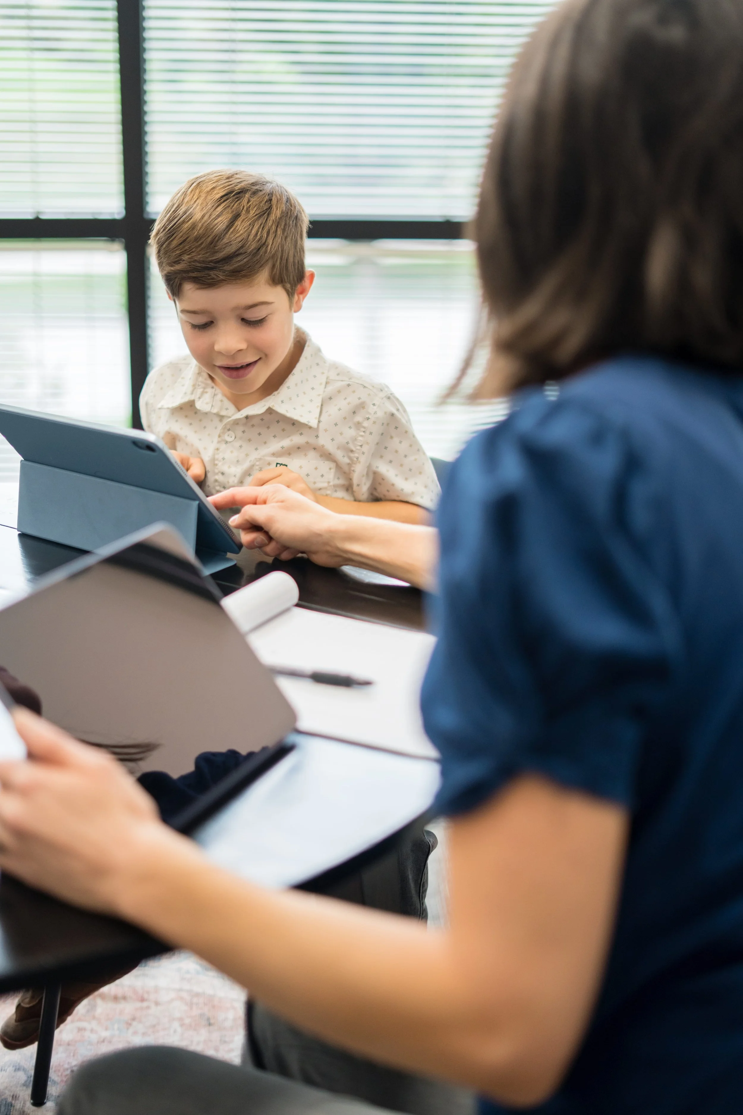 Child completing individualized testing with a psychologist
