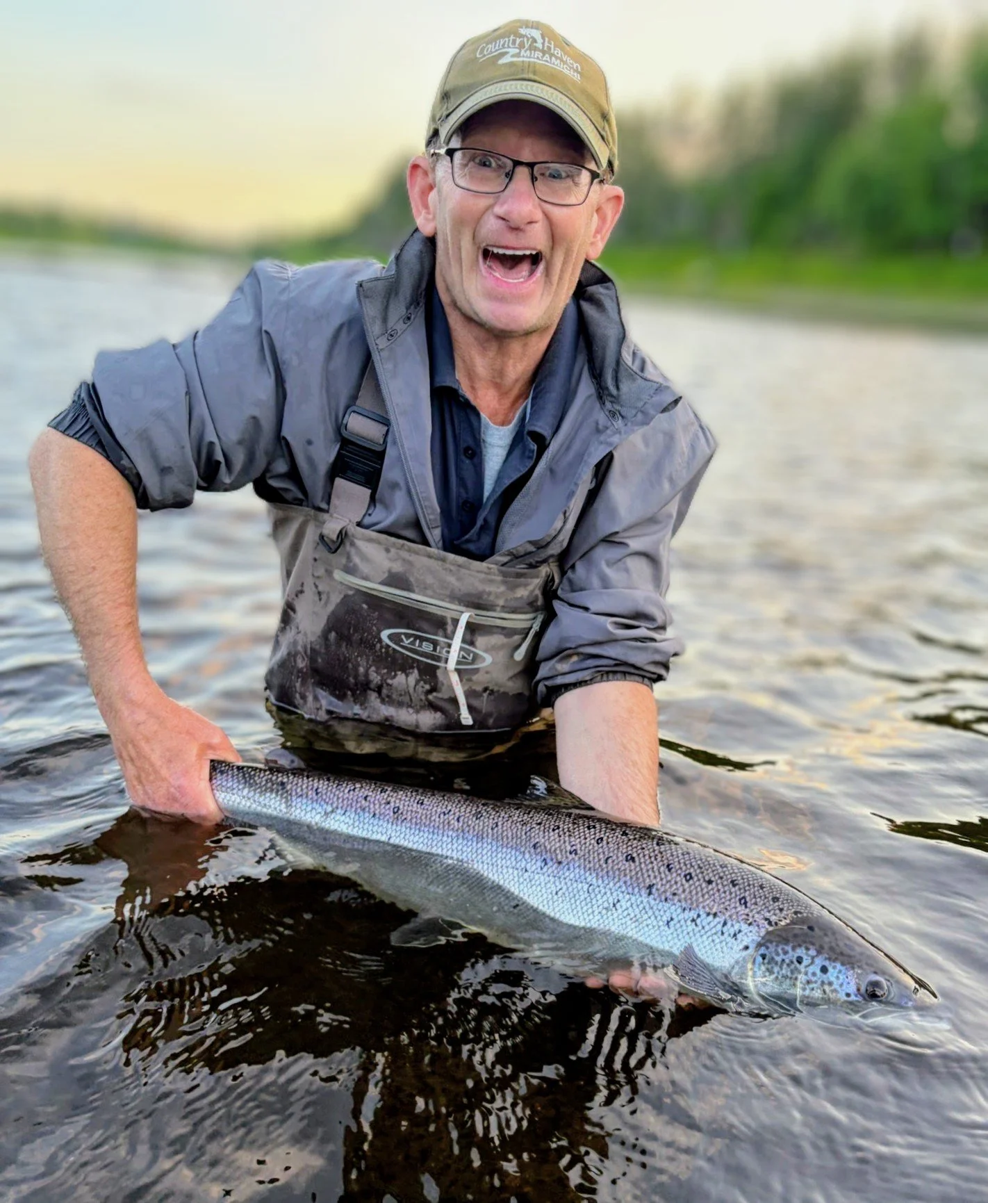Hat and Peter Graham, PEI, with Big Smile and Salmon