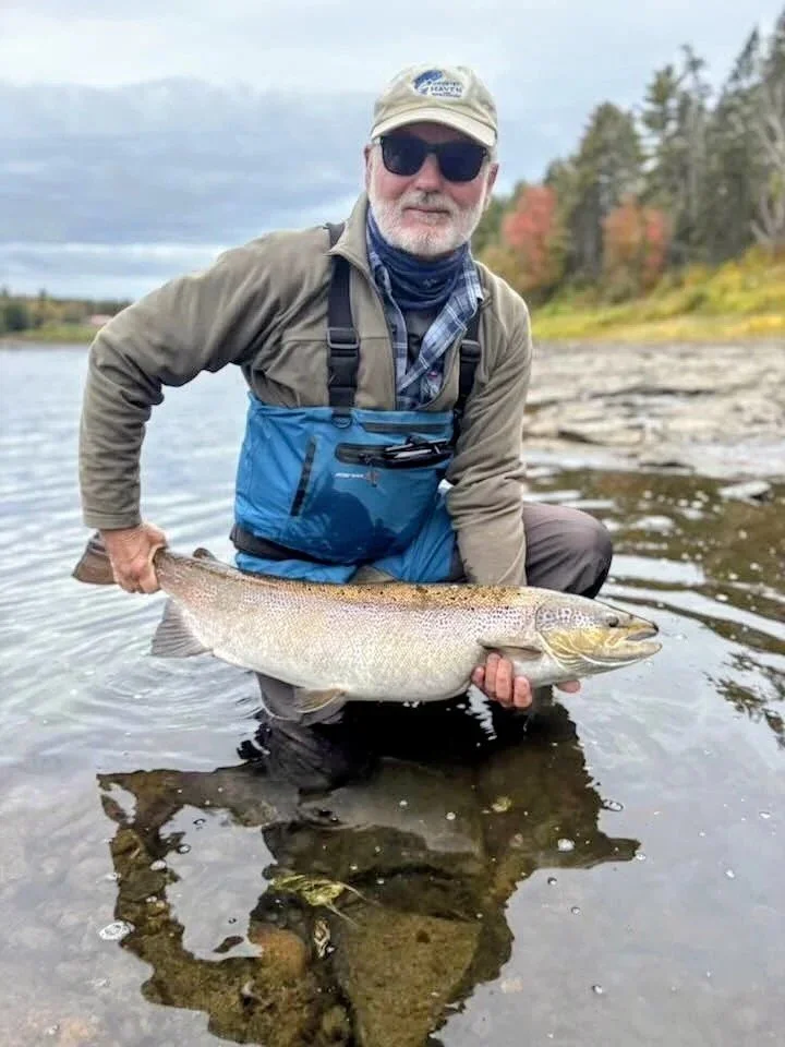 Richard from the UK and Hat with another big Salmon