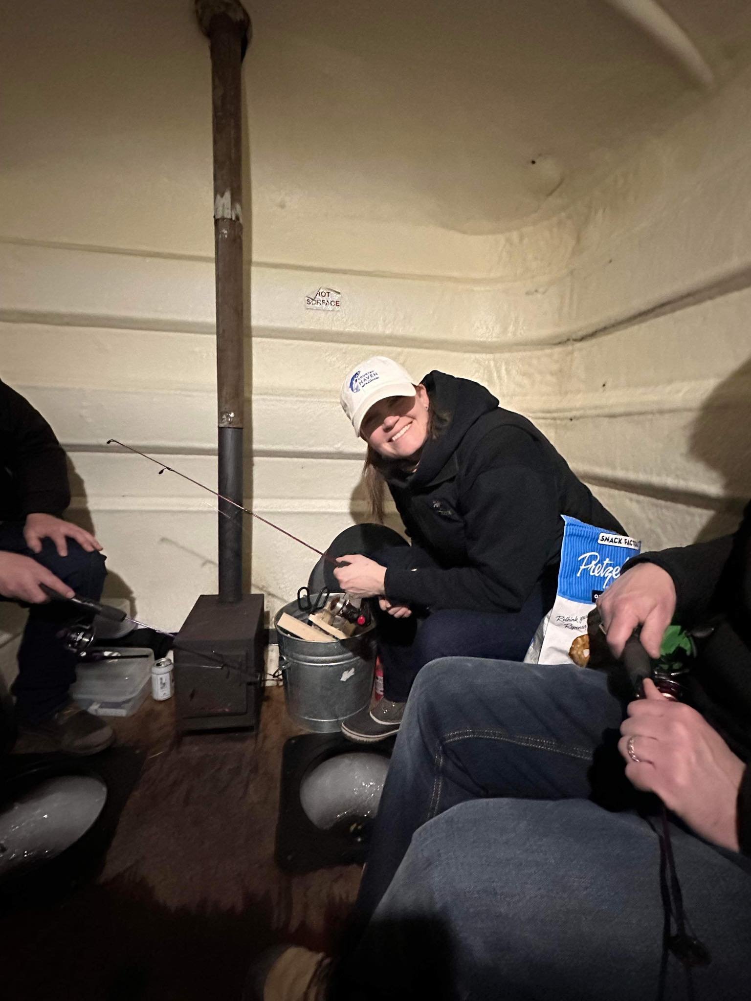 Hat is ice fishing in Renforth, NB