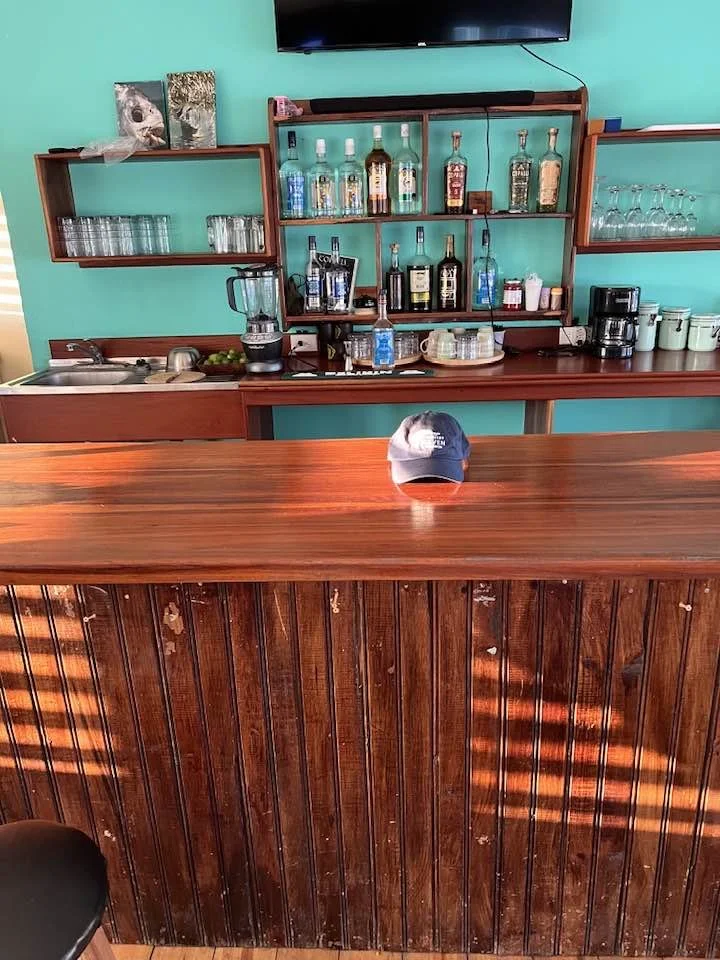 Bob Mosher and his Hat in Belize fishing Permit