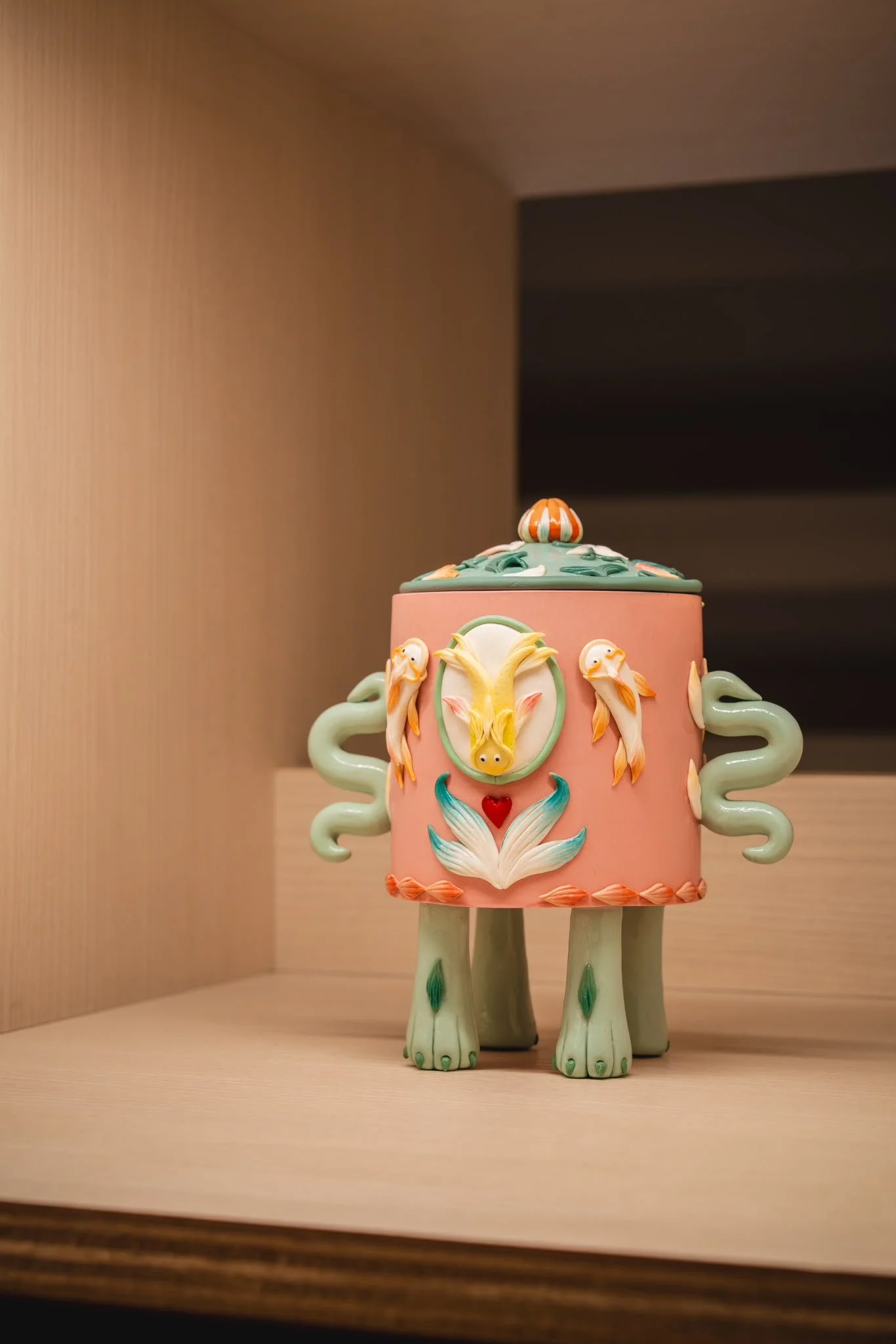 'Lotus Fish Snuff Bottle' 2023, polymer clay, jesmonite, chalk and gloss, 16 x 16 x 12 cm