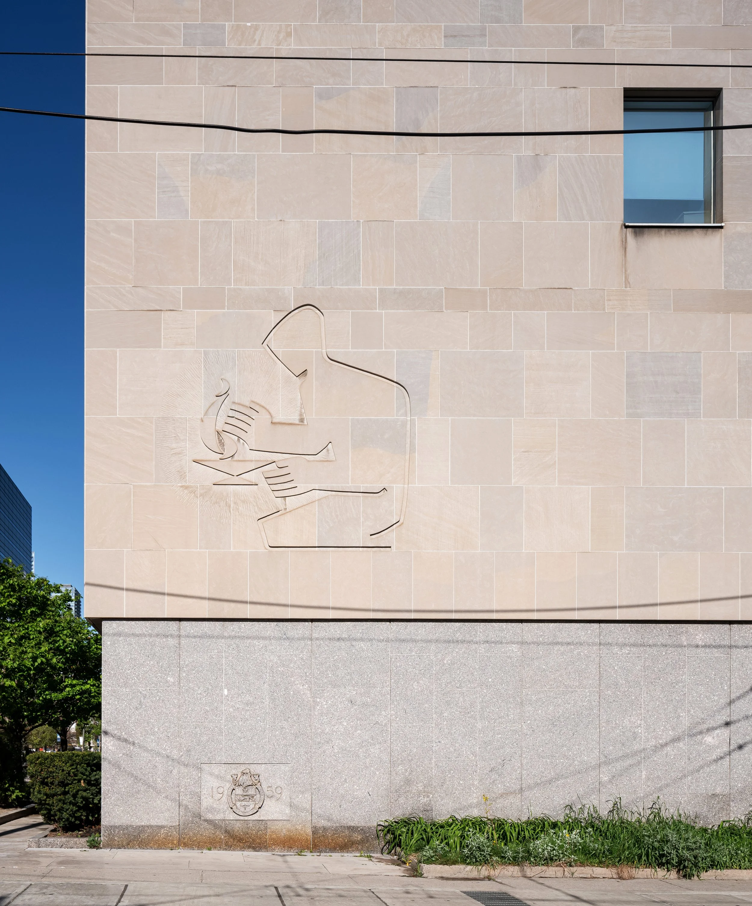 Brick building exterior with a kangaroo sculpture