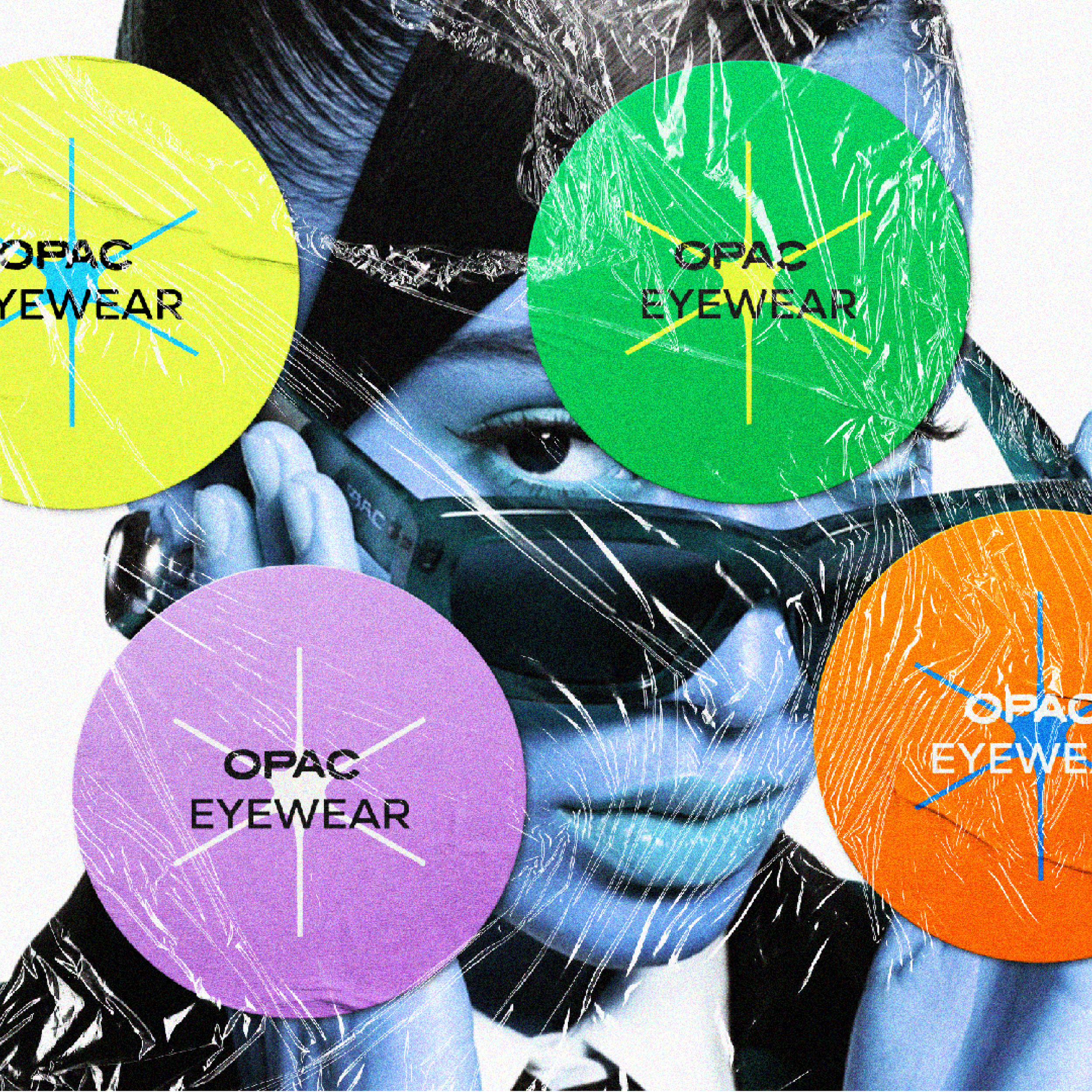 Close-up of colorful circular stickers with the words 'OPAC EYEWEAR' on a black and white photograph background of eyes and part of a person's face.