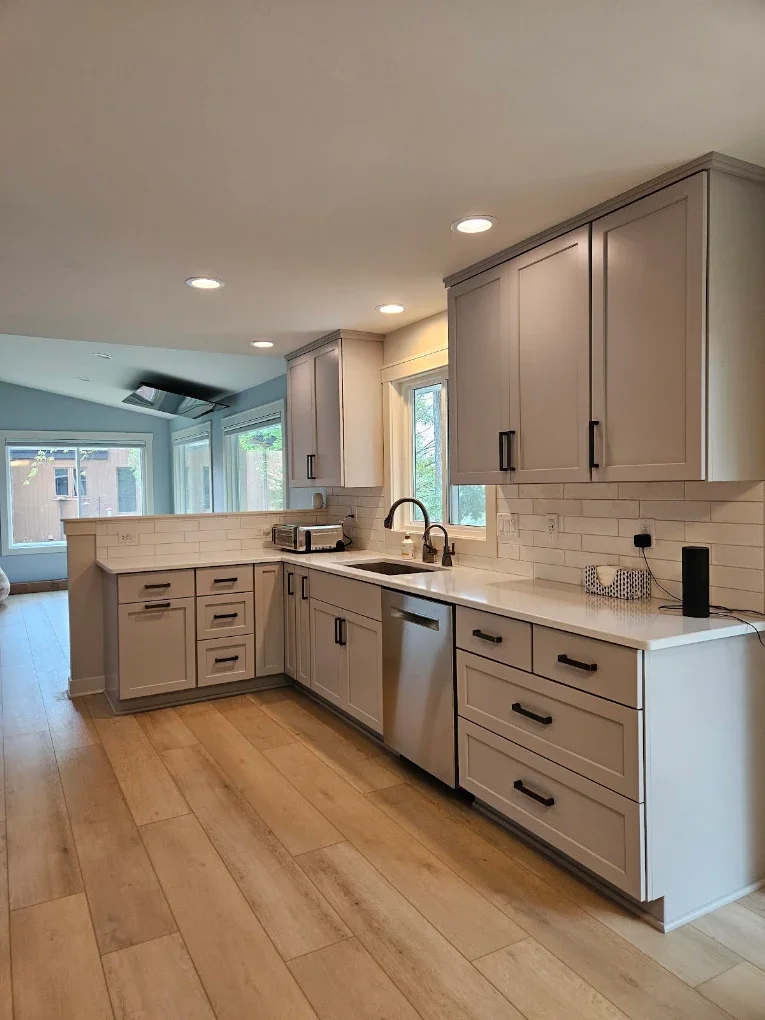 Full Kitchen Remodel, with Laundry Room, and First Floor Complete Millwork. Custom Doors, Floors, and Closets 