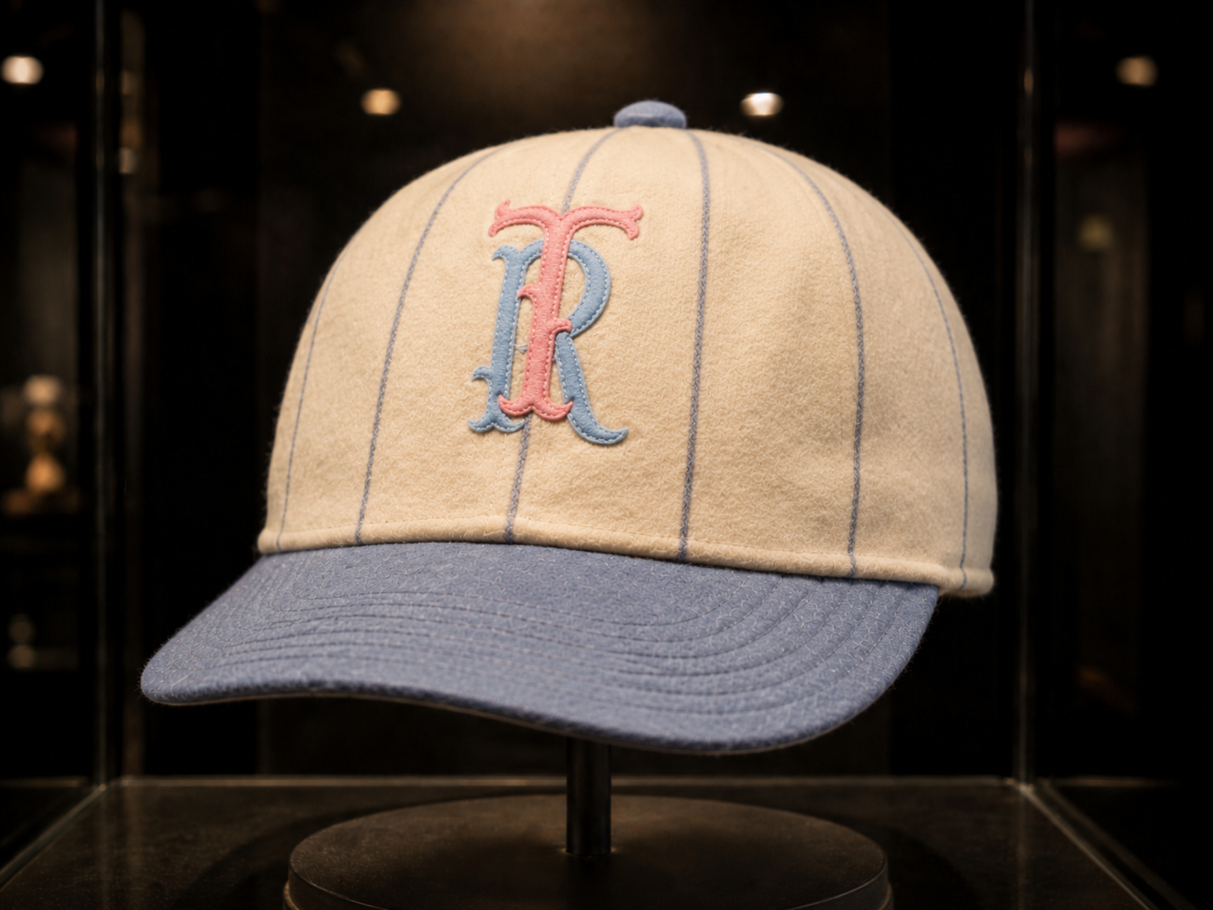 Tyler Roses pinstriped cap.