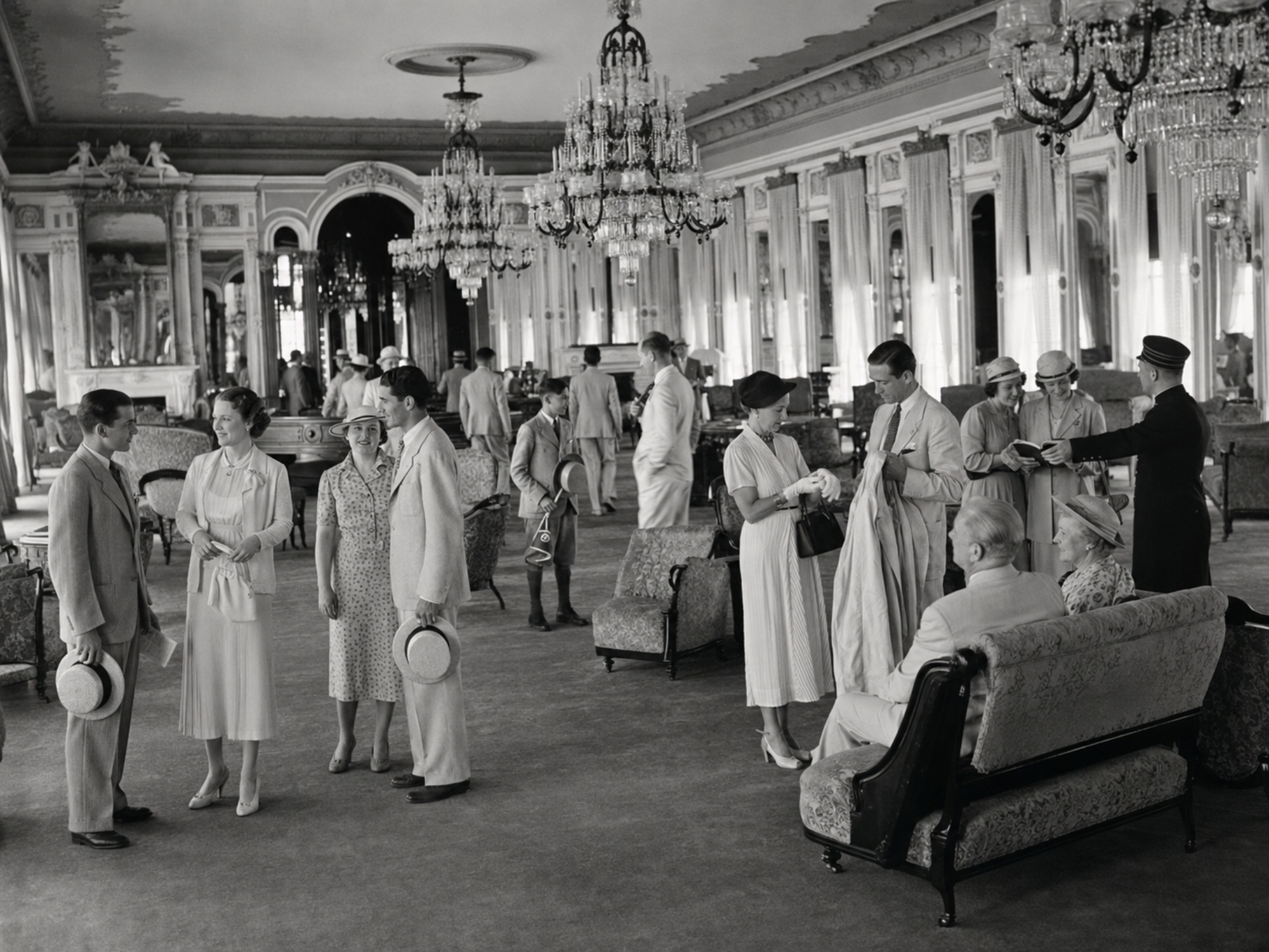 Guests carrying Fascinators programs prepare to leave the Grand Union Hotel for an evening game at The Hatbox.