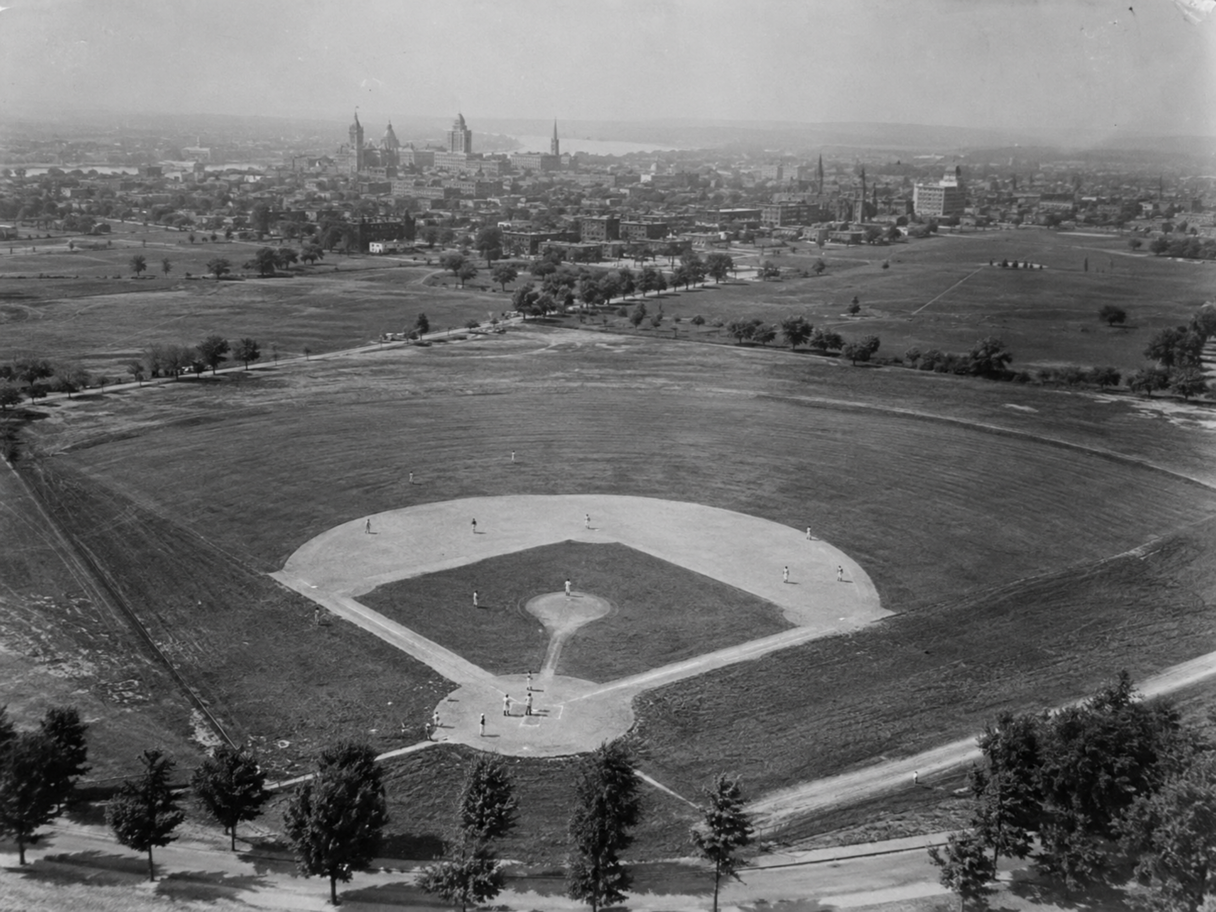 Black-and-white aerial photograph of an open Albany municipal baseball field used by the Orange Wonders for practice.