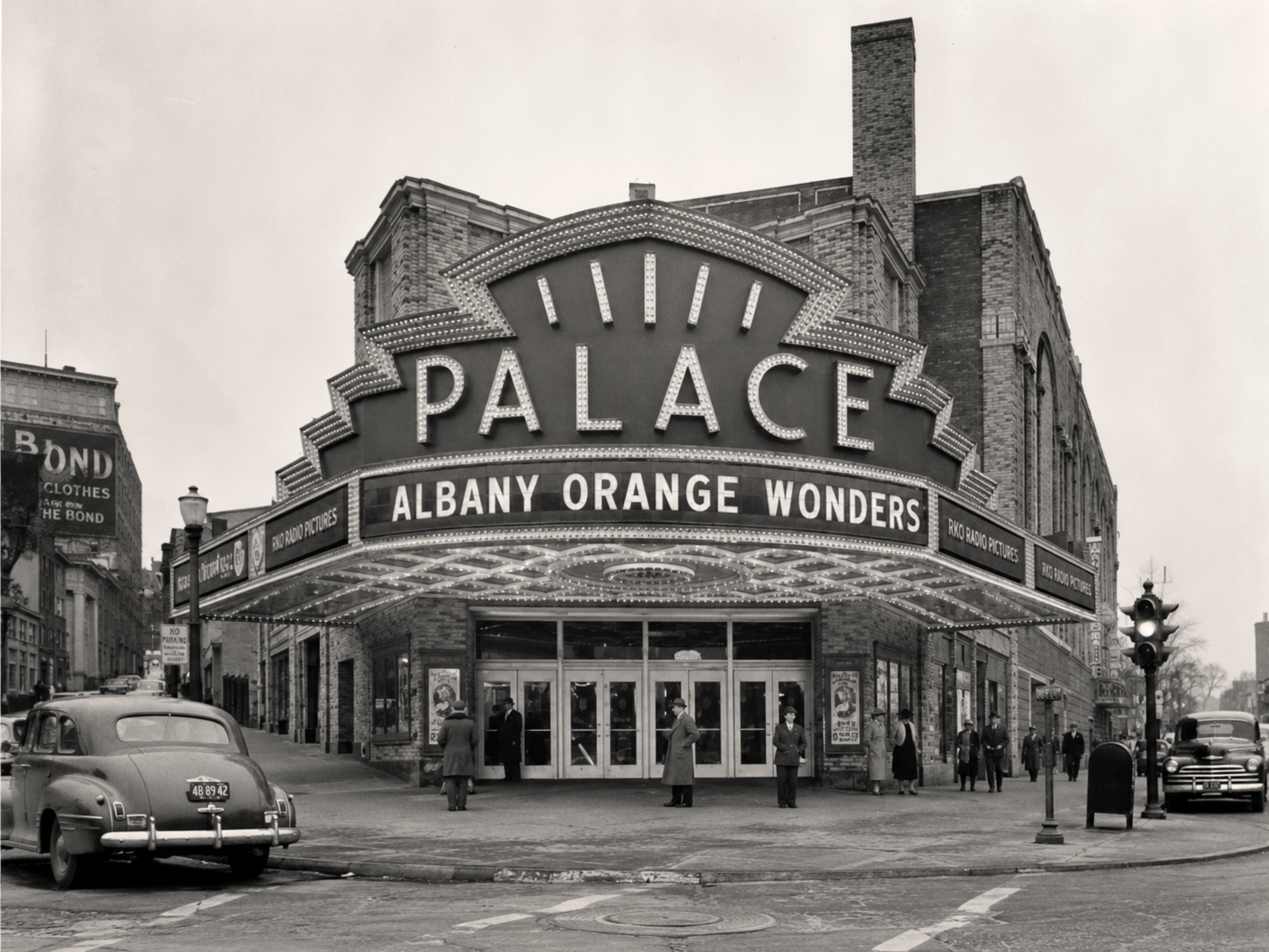 Black-and-white photograph of the Palace Theatre marquee reading Albany Orange Wonders.