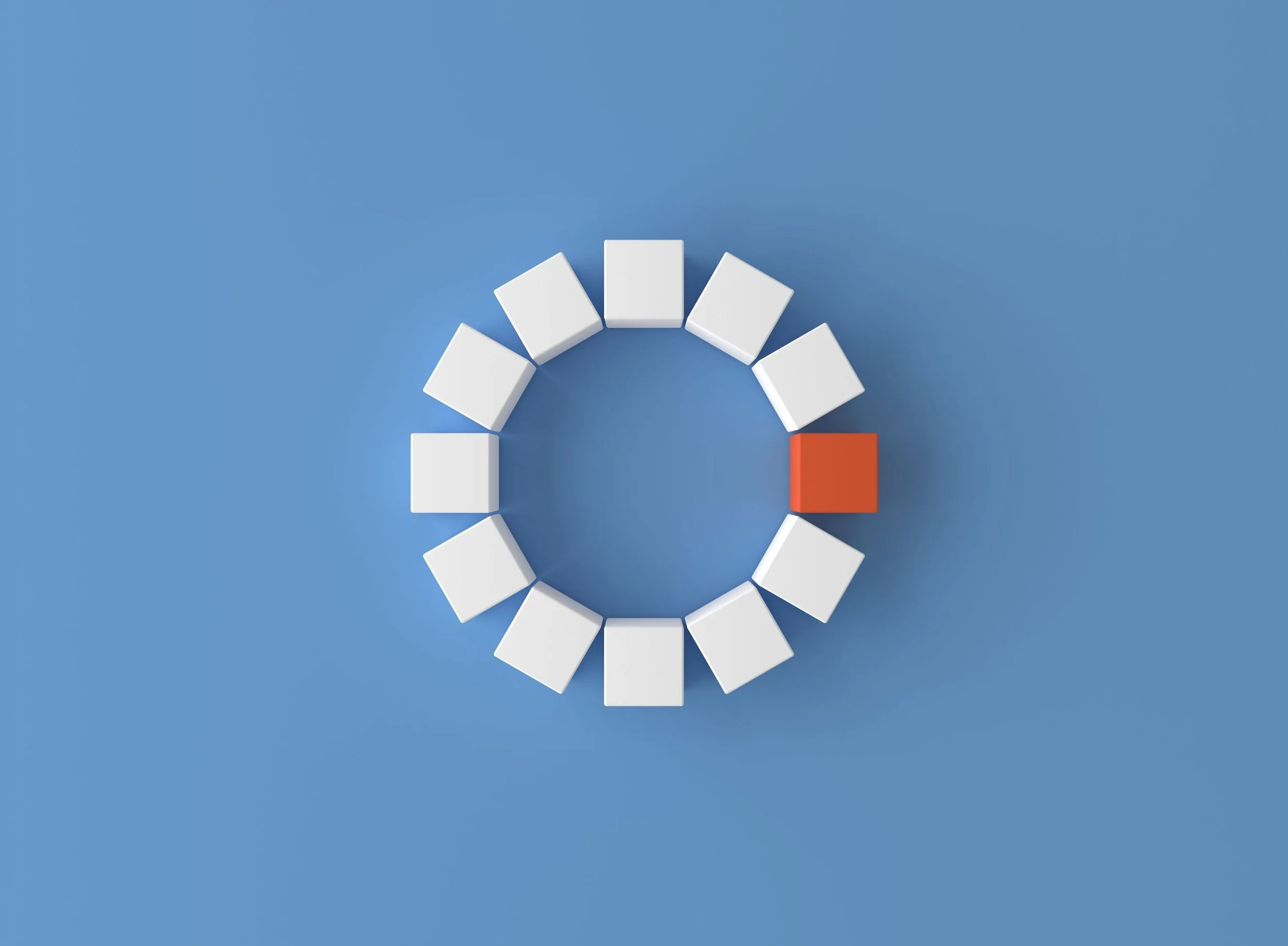 White tiles arranged in a semi-circle on a light blue background, with one red domino tile at the circle's edge.