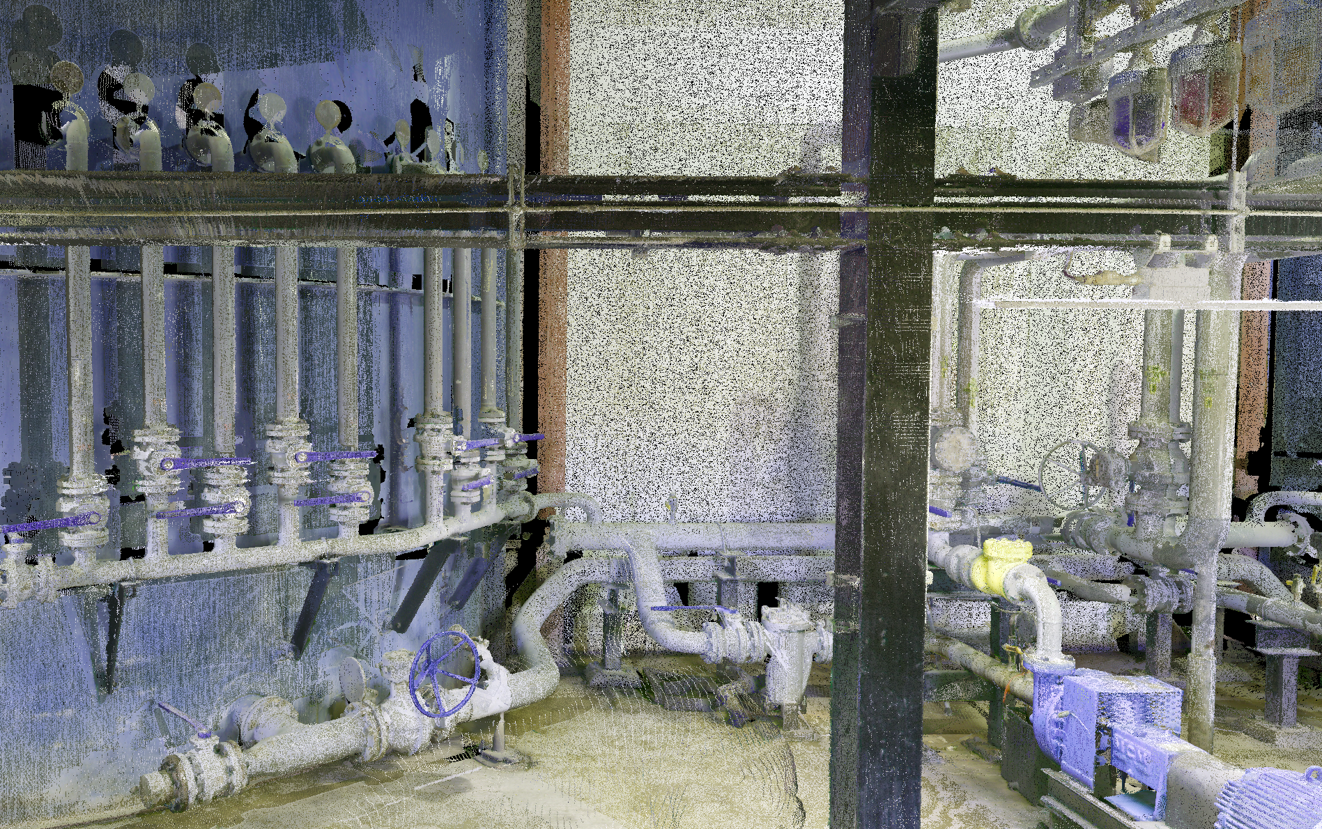 An industrial setup with multiple pipes, valves, and machinery in a utility or mechanical room, with a dark vertical post in the middle.