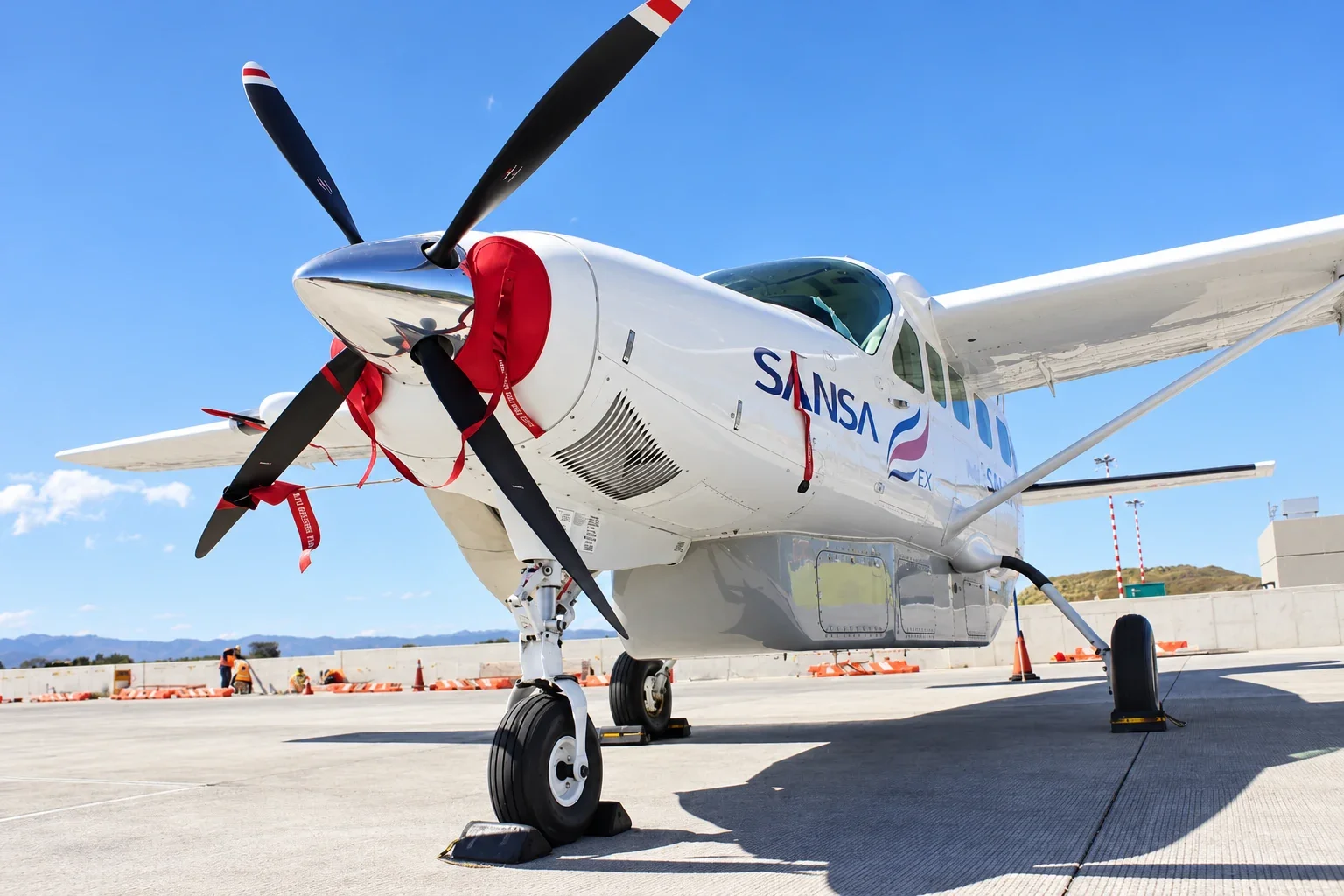 SANSA Airlines aircraft parked at SJO domestic terminal Costa Rica.