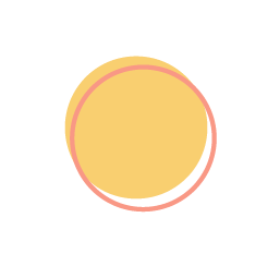 A yellow cookie with pink icing and a yellow lining, with a bite taken out.