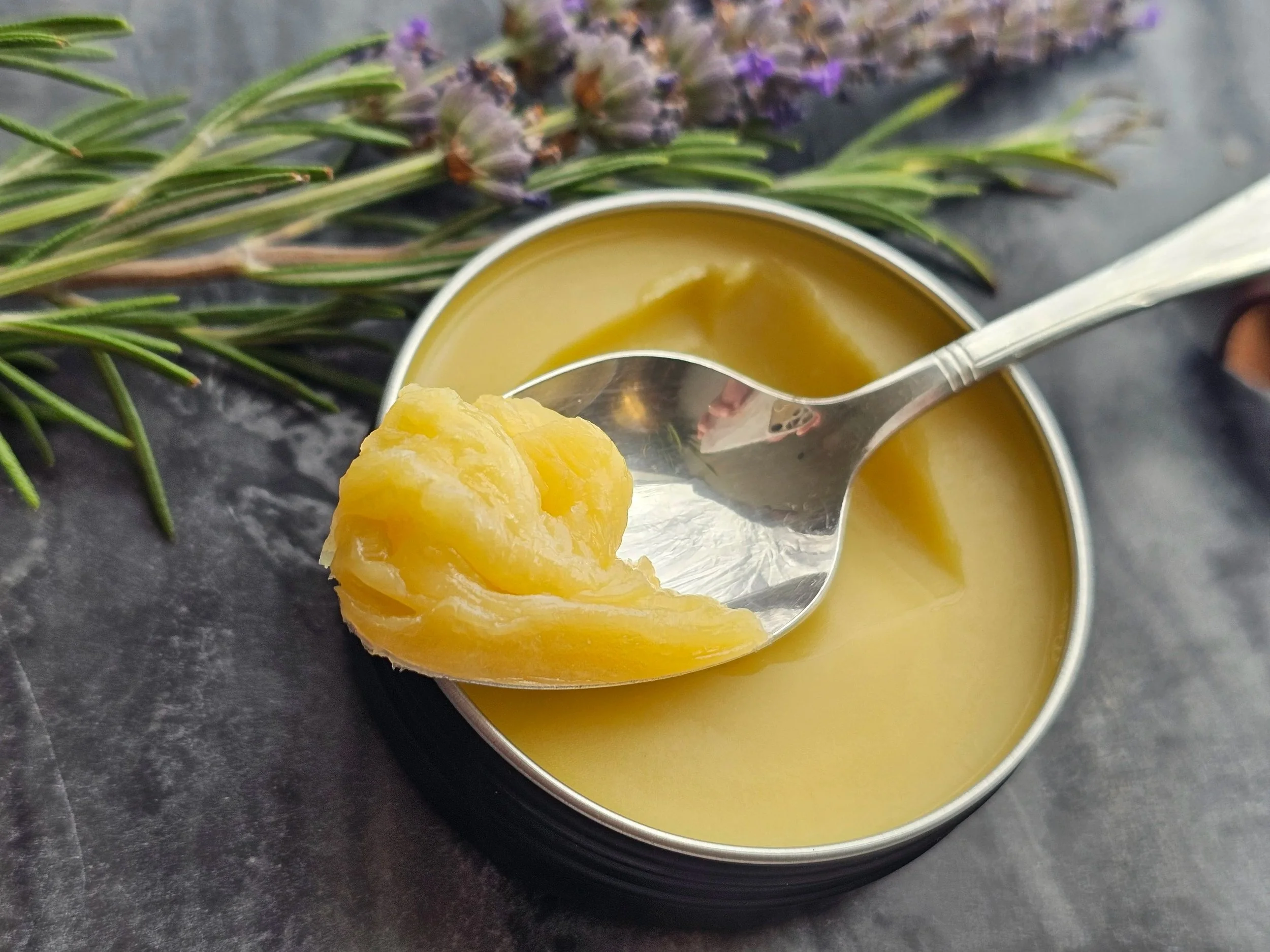 Belle Terre Lavender CBD Body Balm scooped from tin