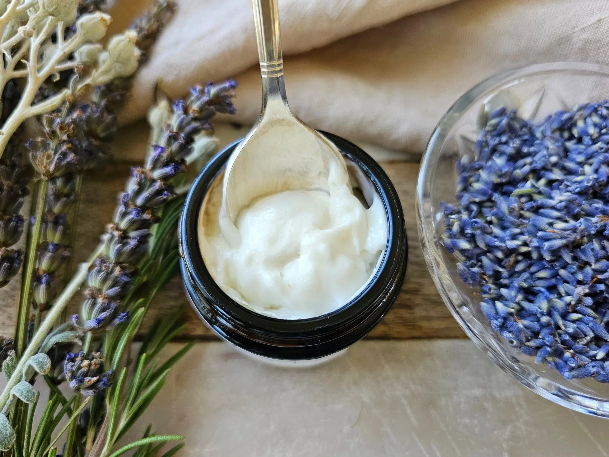 Belle Terre Lavender Bakuchiol and Reishi Face Cream scooped from jar