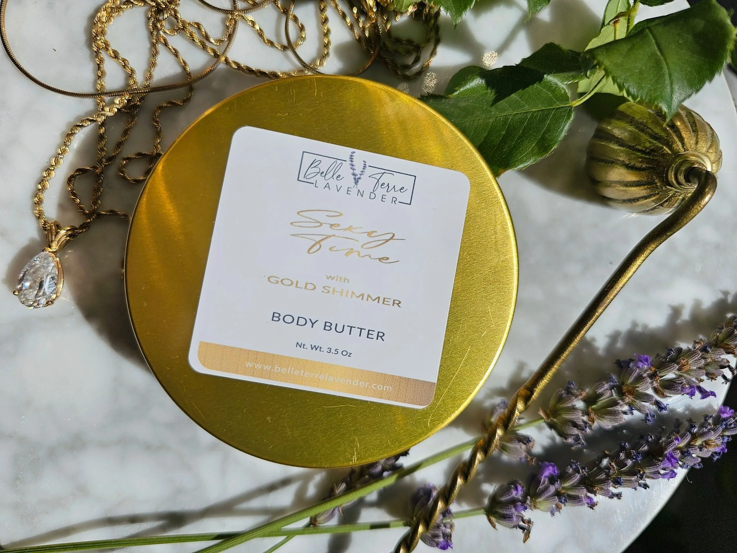 Belle Terre Lavender Body Glow Body Butter tin with gold shimmer