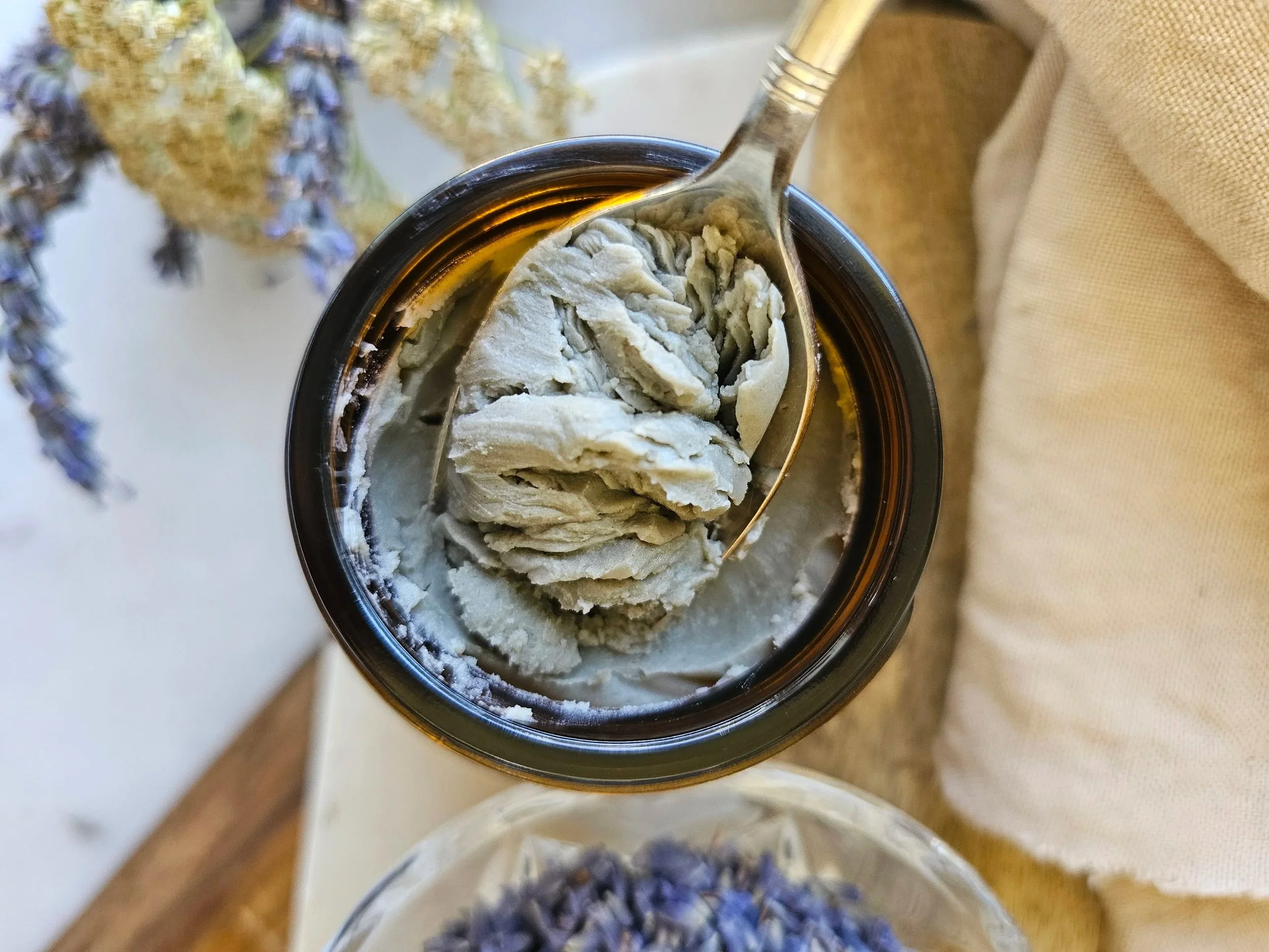 Belle Terre Lavender French Green Clay Cleansing Balm scooped from jar